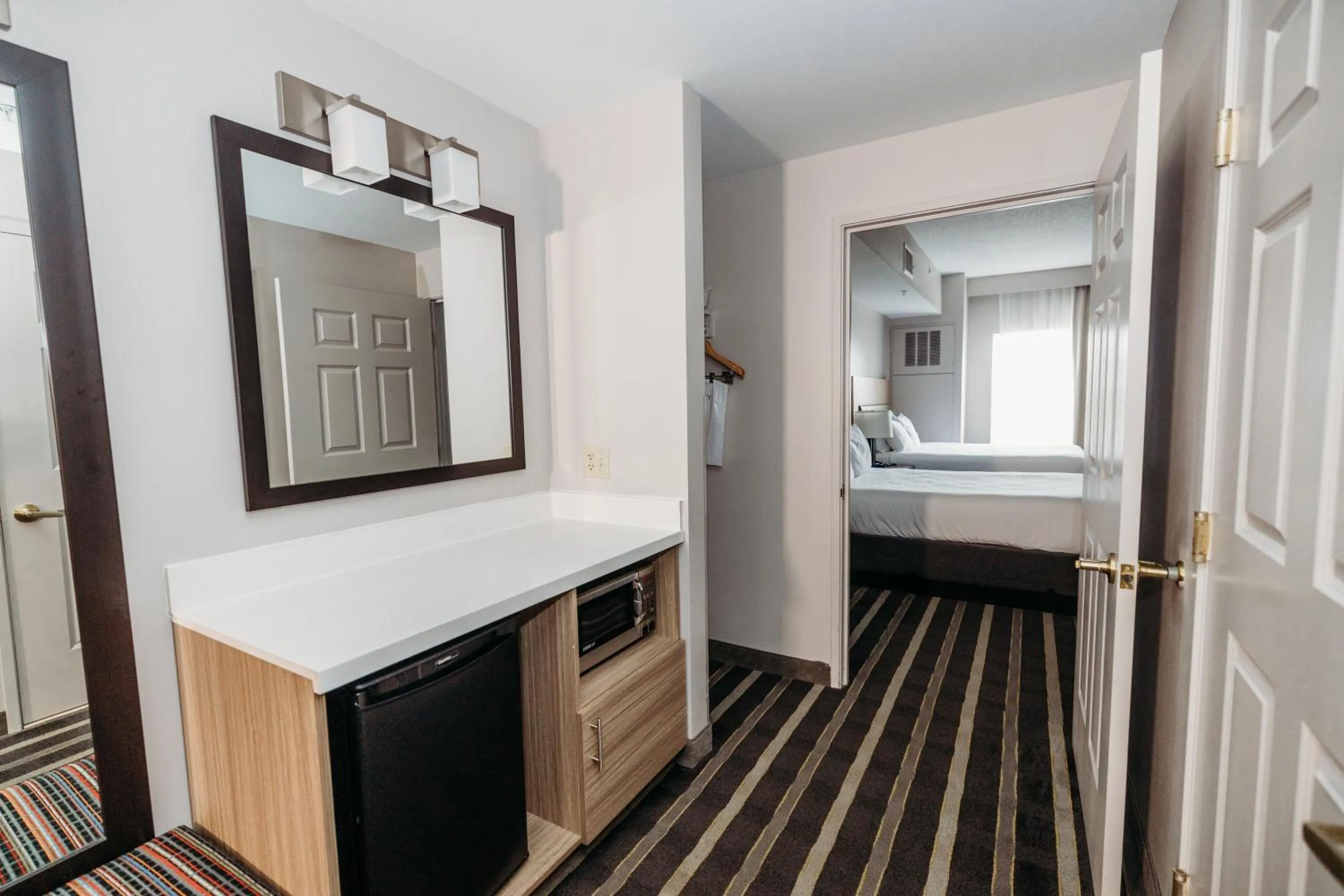 Seating area, Bed in Parkview Inn & Suites, Lancaster Amish Country, PA