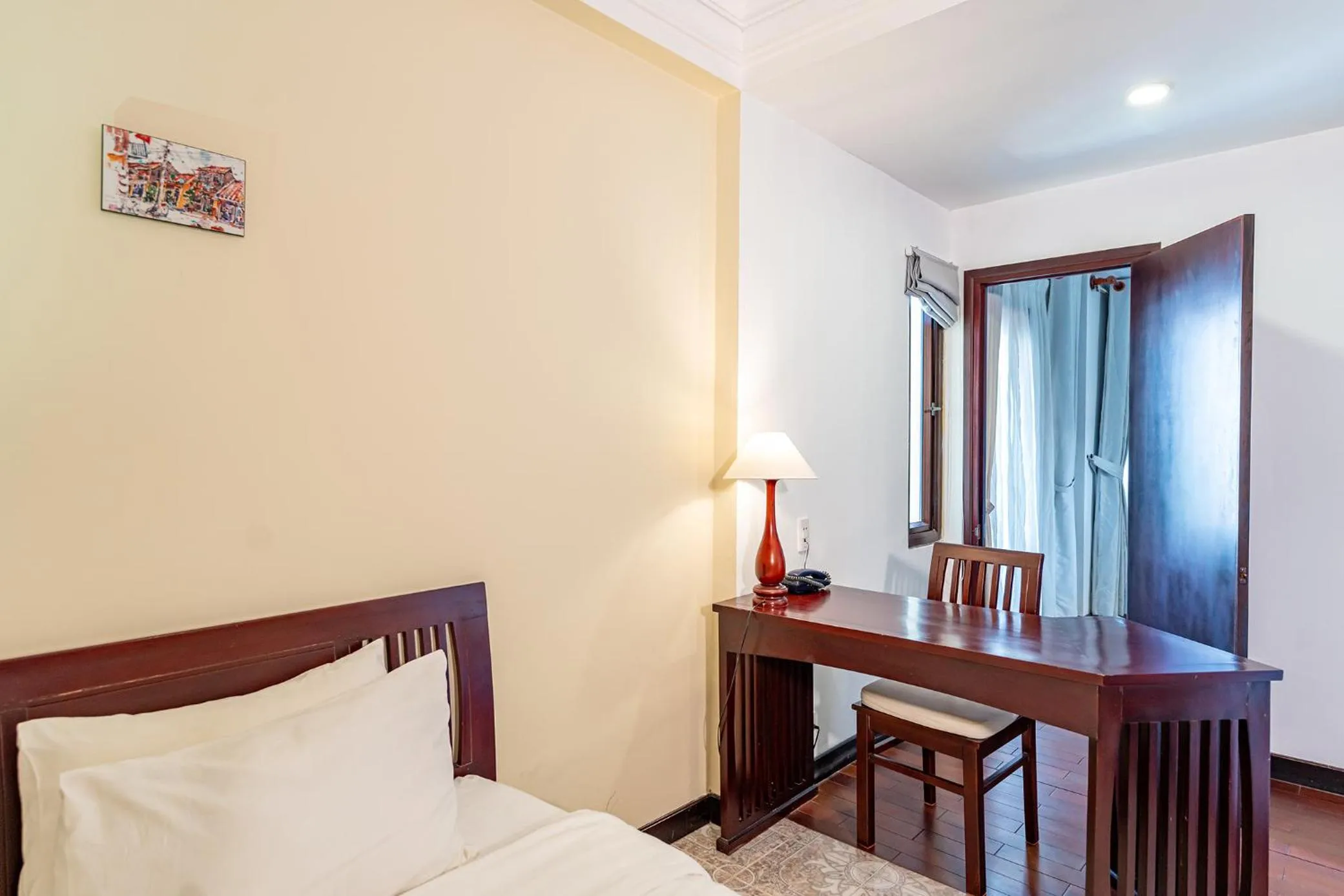 Seating area, Bed in ANNAM HERITAGE Boutique Hotel & Spa