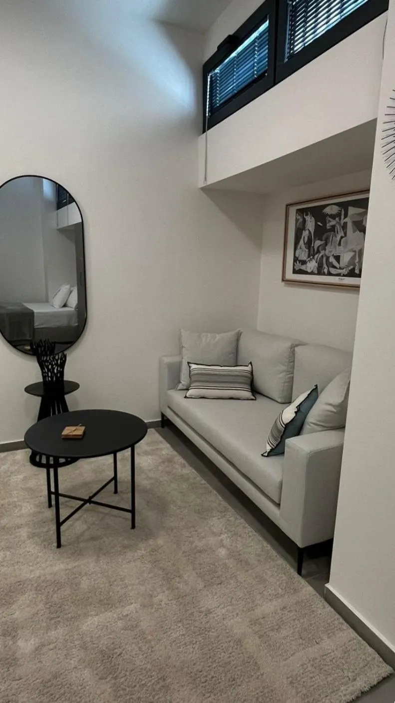 Seating area in AIONION RESIDENCES by K&K