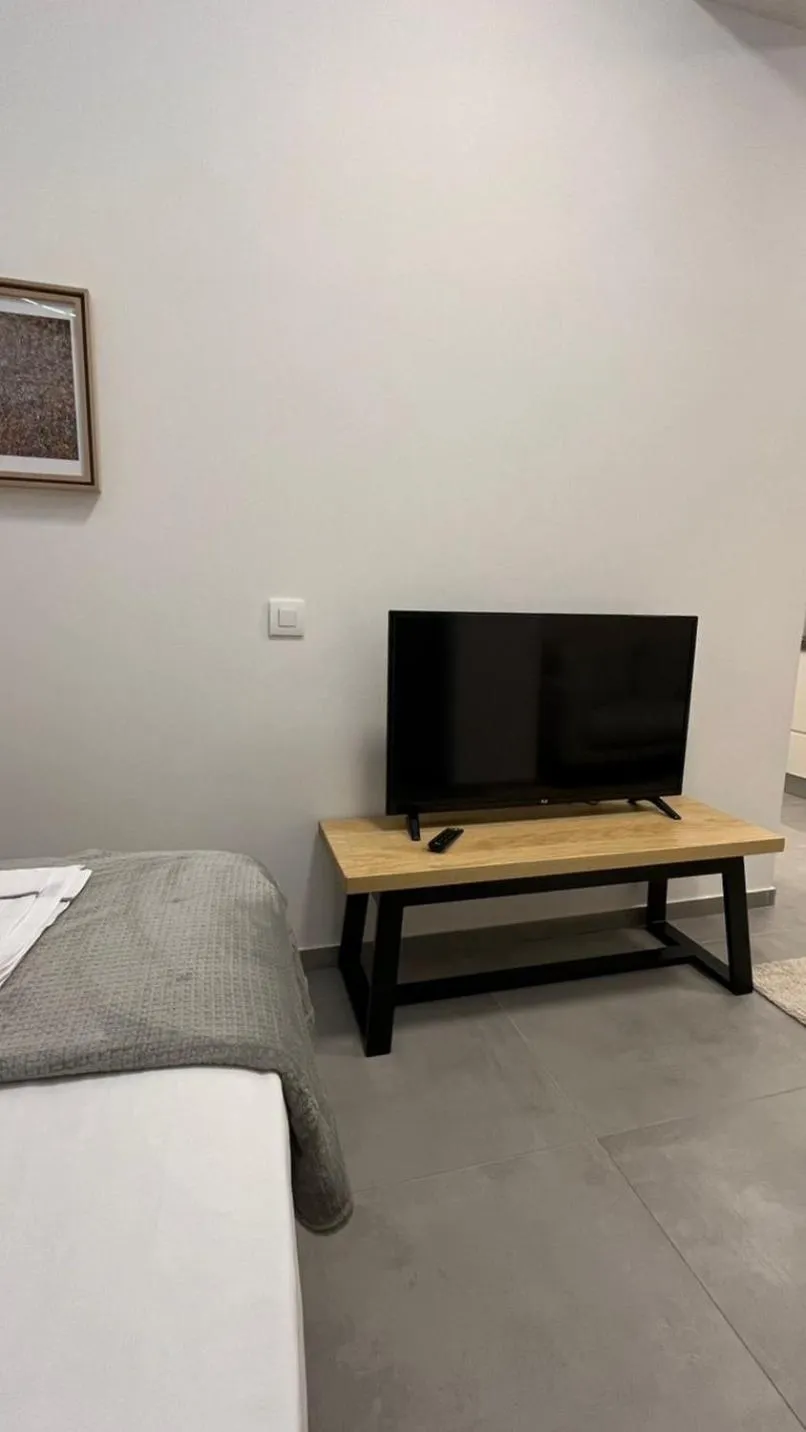 TV and multimedia, Bed in AIONION RESIDENCES by K&K