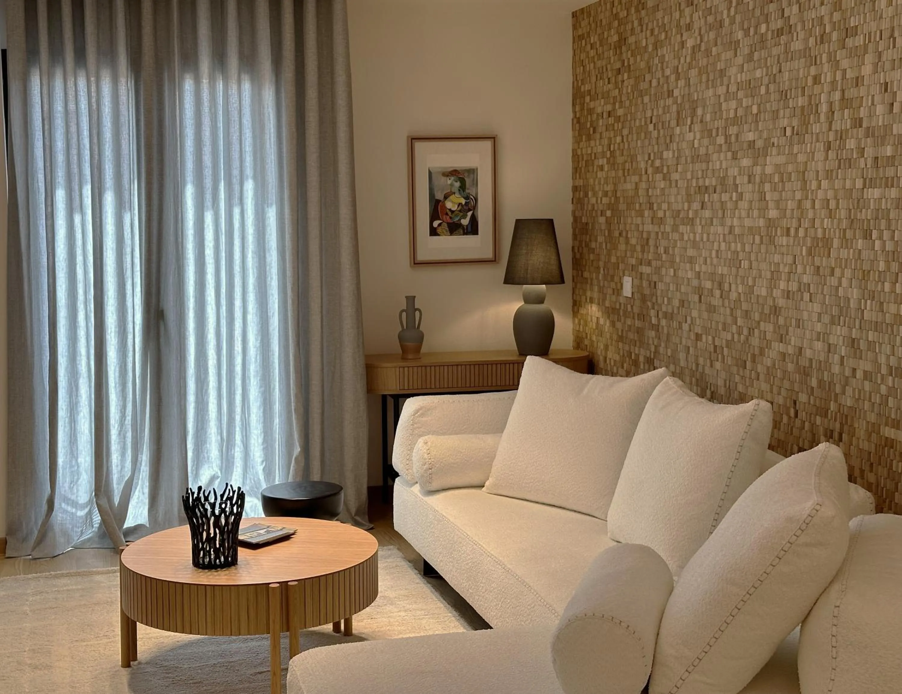 Living room in AIONION RESIDENCES by K&K