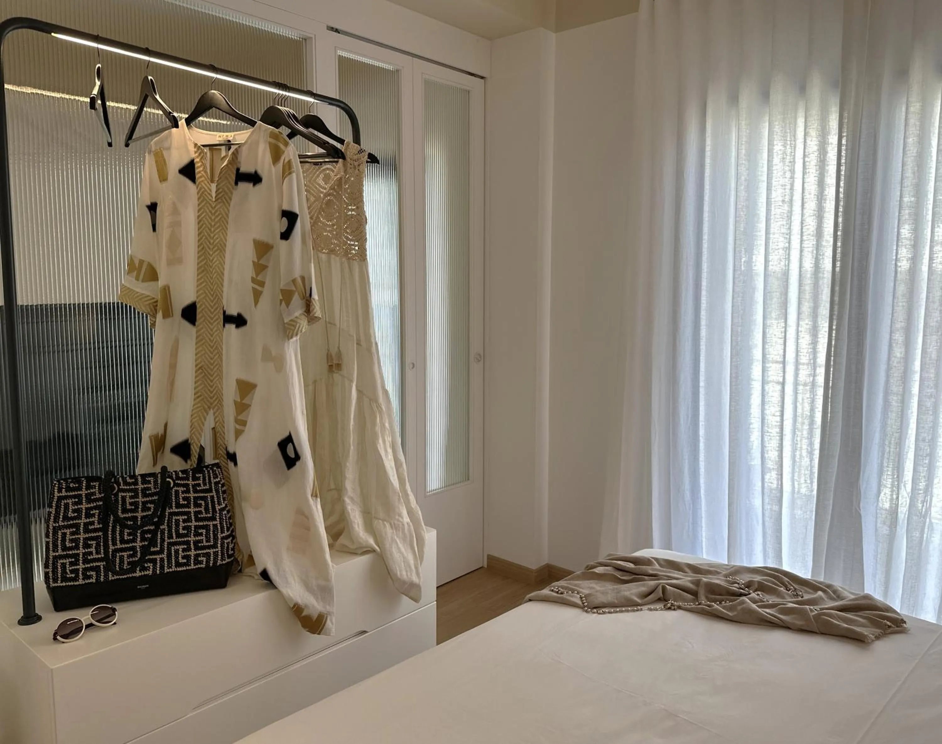 Bed in AIONION RESIDENCES by K&K