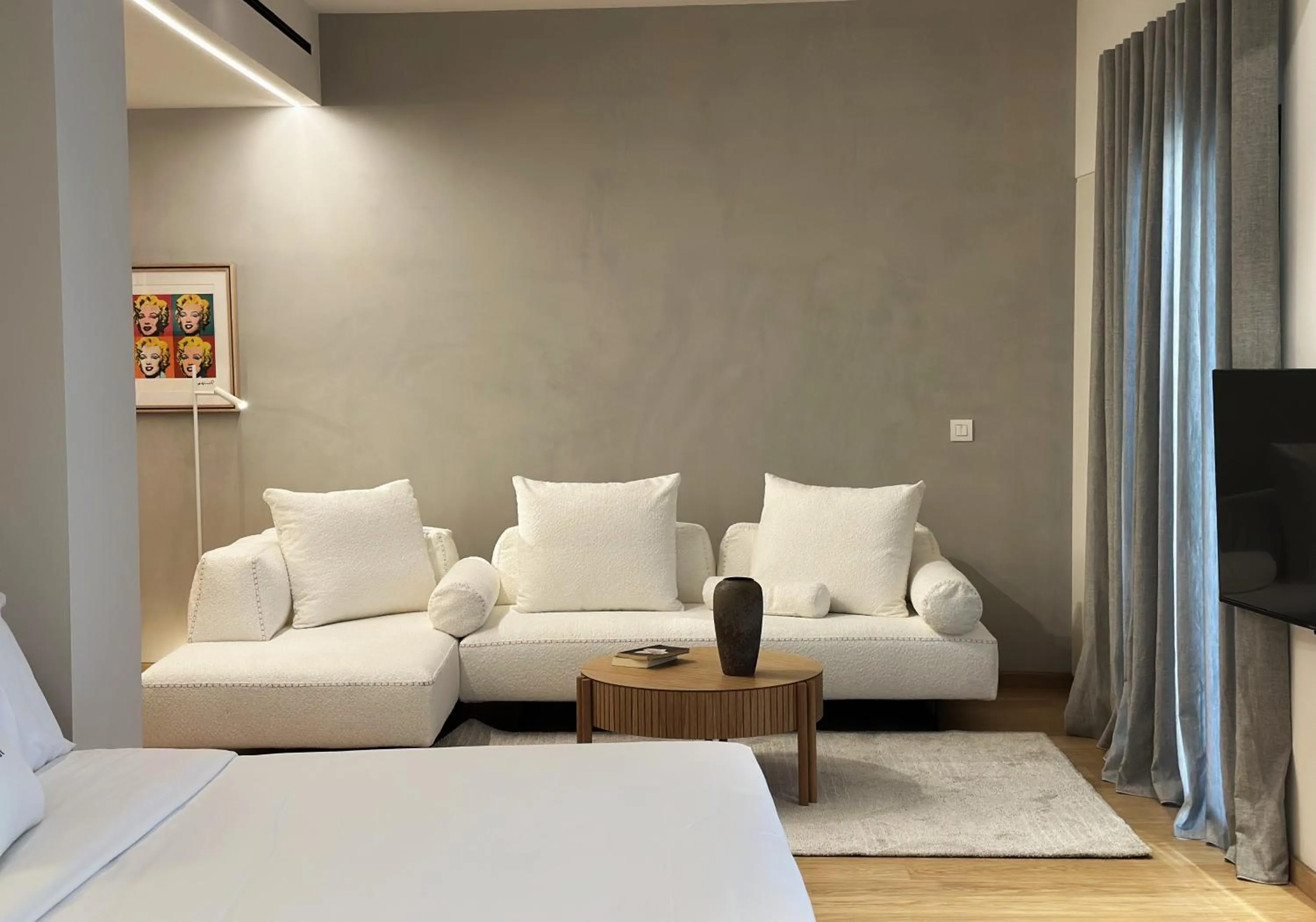 Bed in AIONION RESIDENCES by K&K