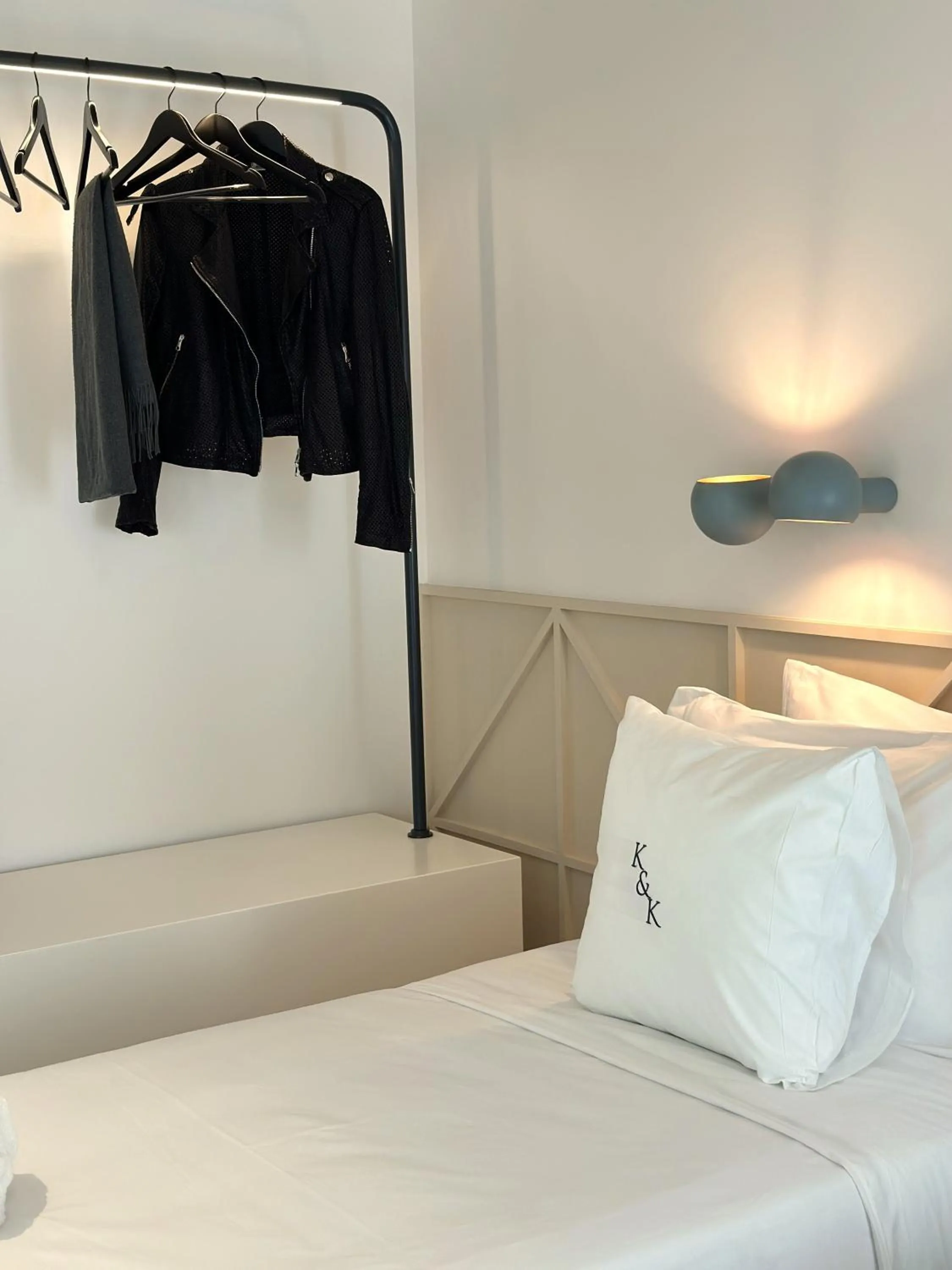 Bed in AIONION RESIDENCES by K&K