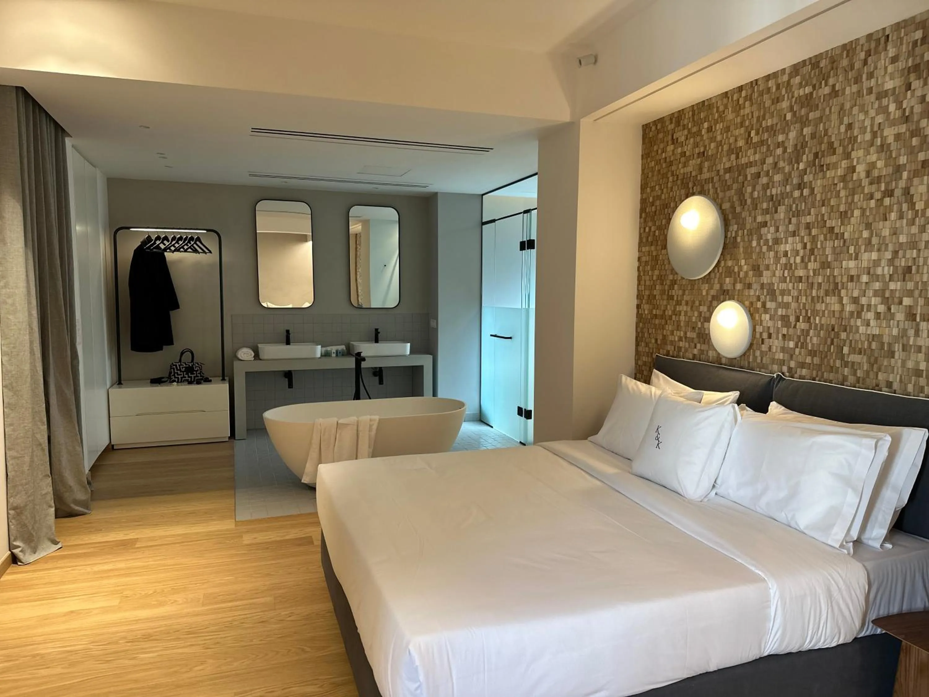 Shower, Bed in AIONION RESIDENCES by K&K