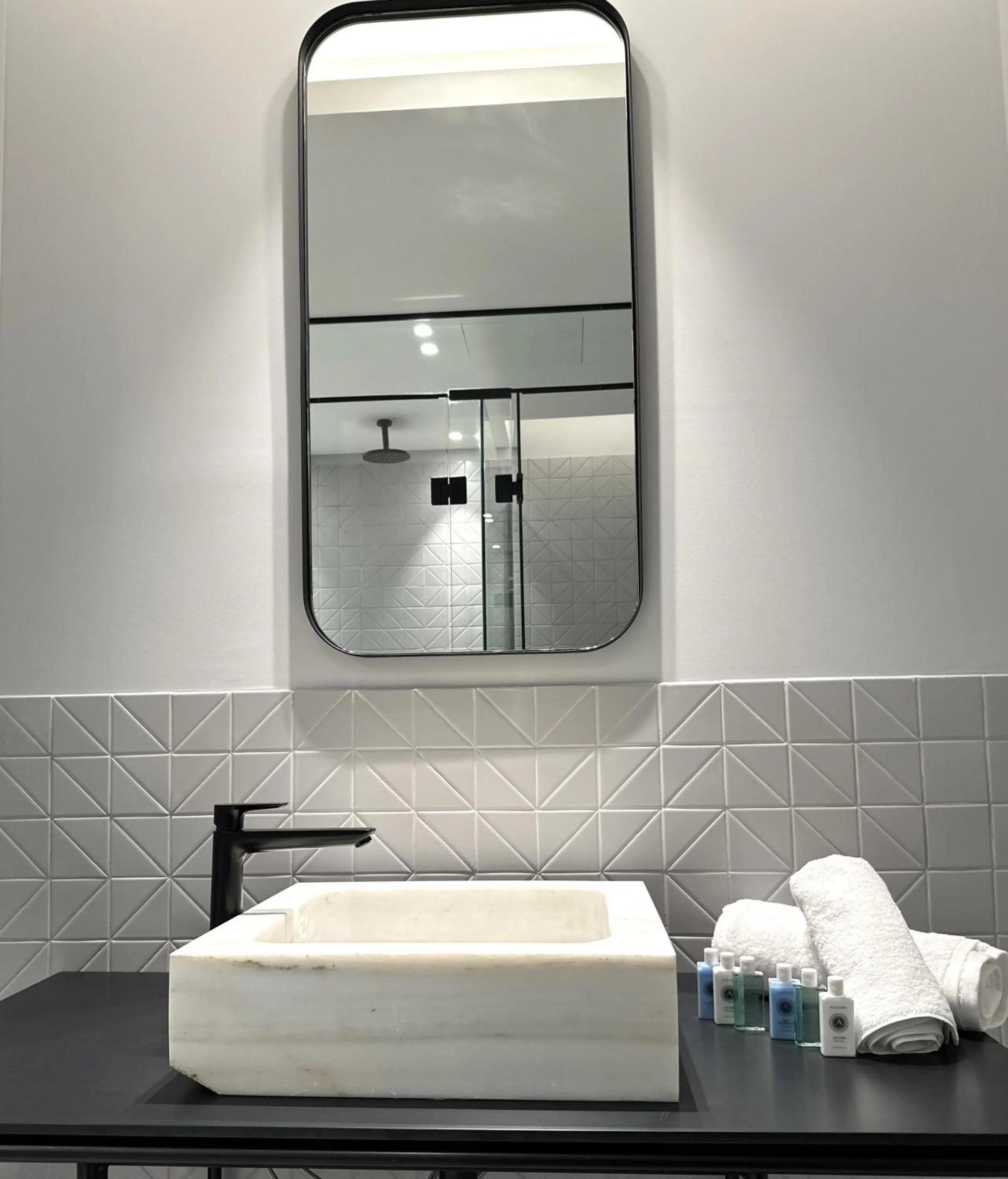 Bathroom in AIONION RESIDENCES by K&K