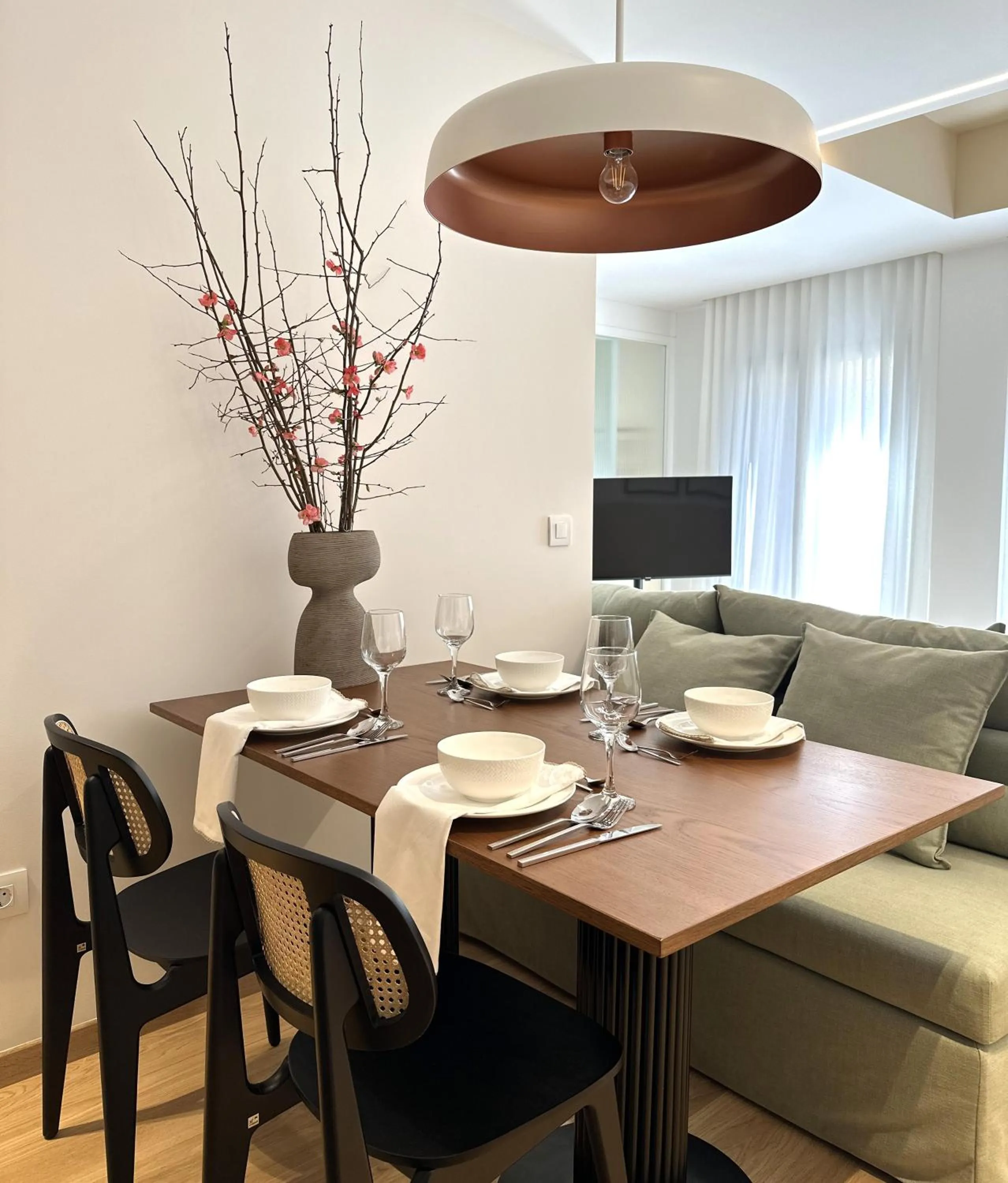 Living room in AIONION RESIDENCES by K&K