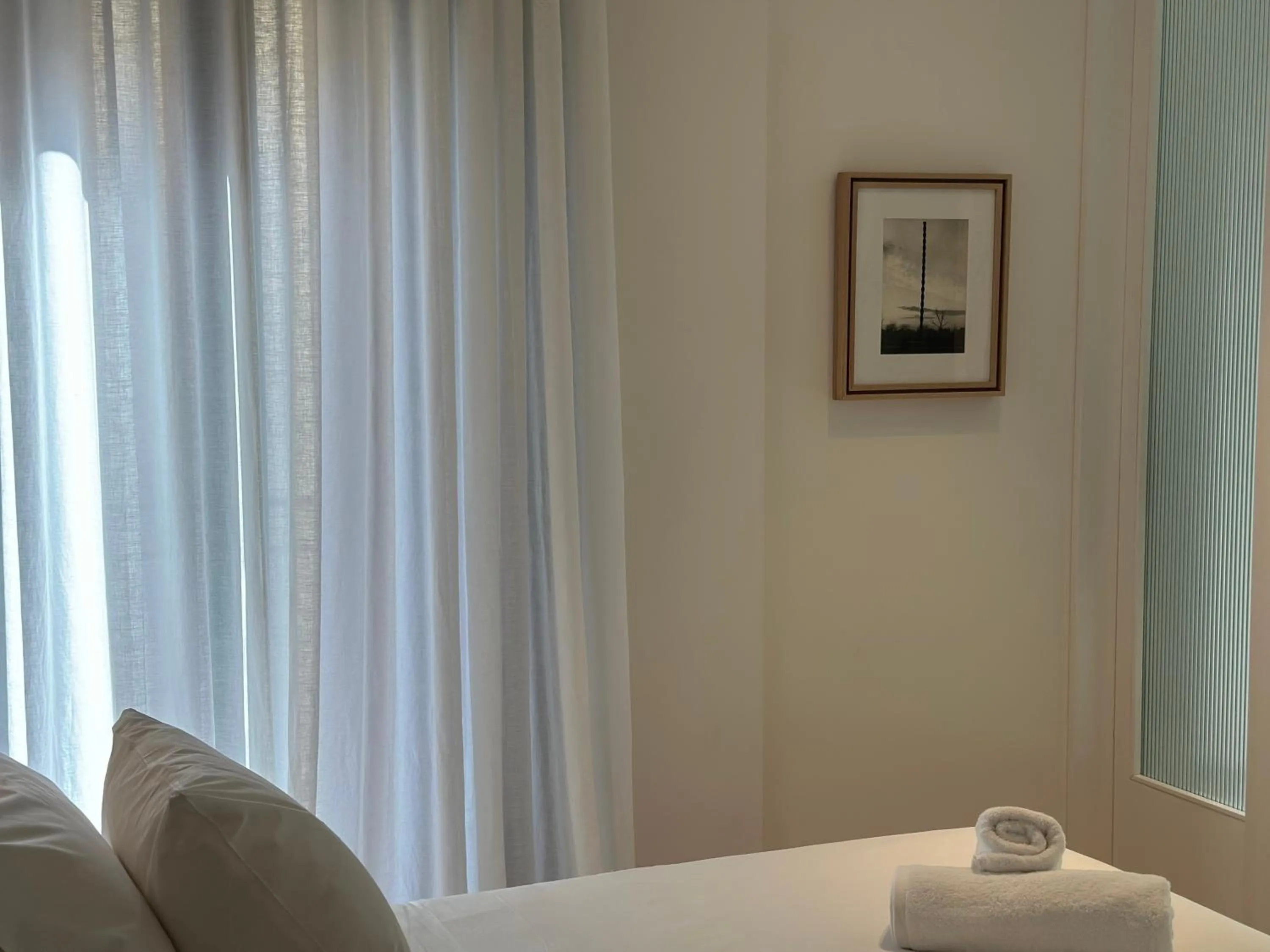 Bed in AIONION RESIDENCES by K&K