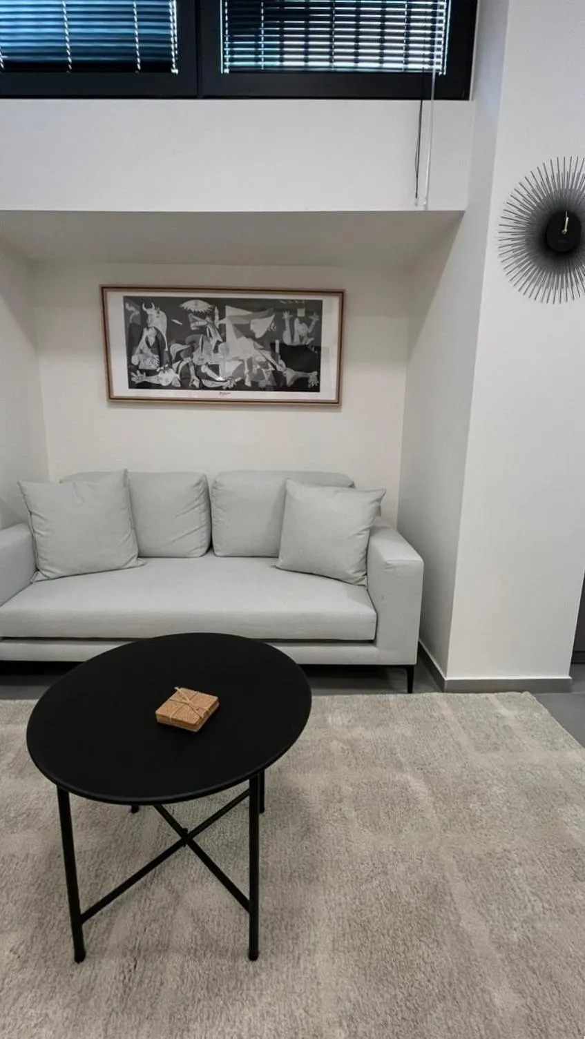 Seating area in AIONION RESIDENCES by K&K