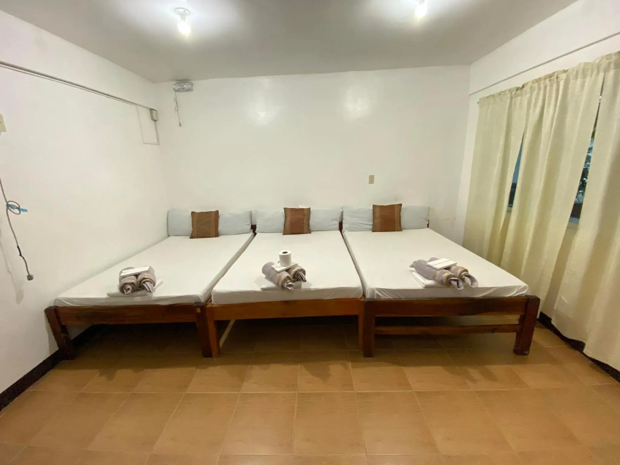 Bed in VILLA LOURDES RESORT