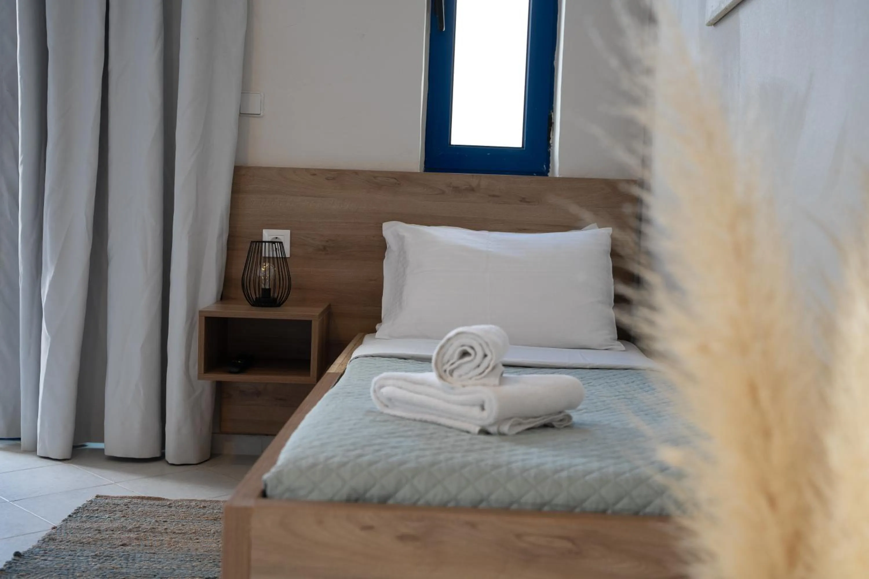 Bed in Yria Beach Hotel