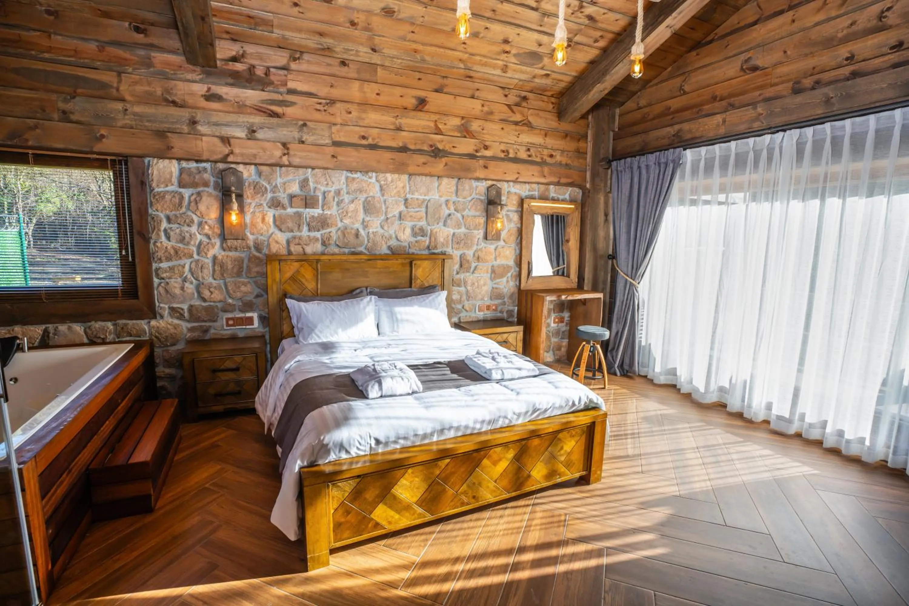 Bed in Bİ ABANT MASALI VİLLAGE HOTEL