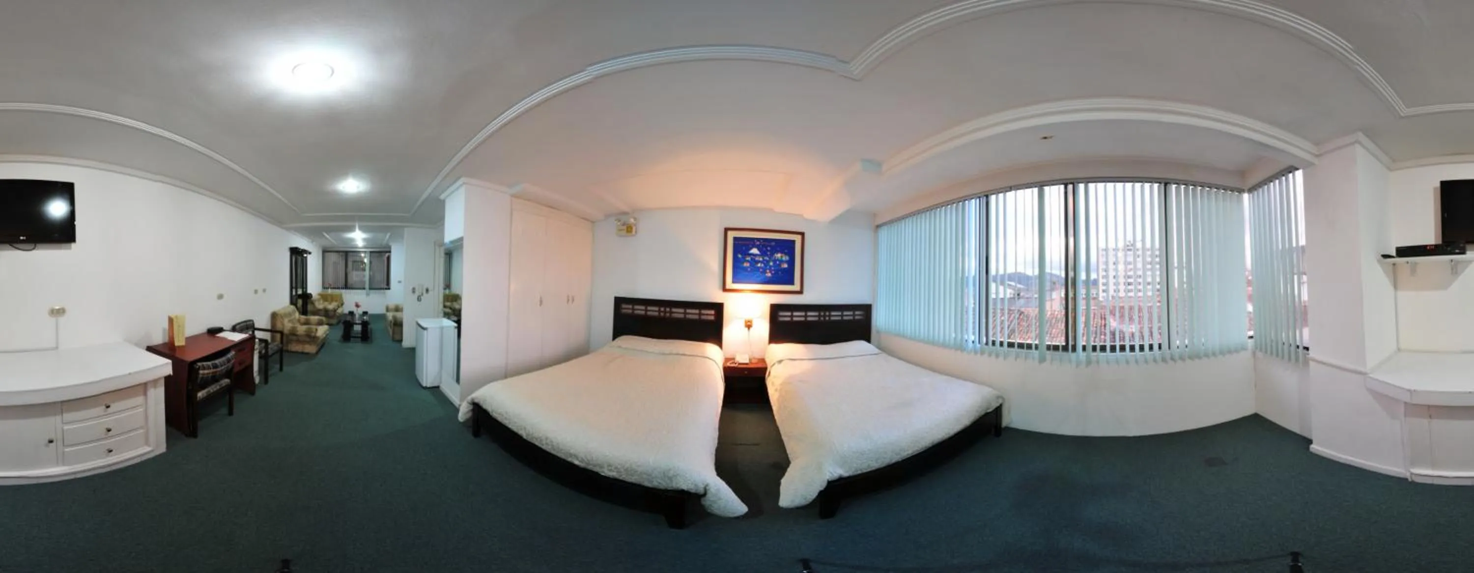 Seating area, Bed in Hotel Cordero