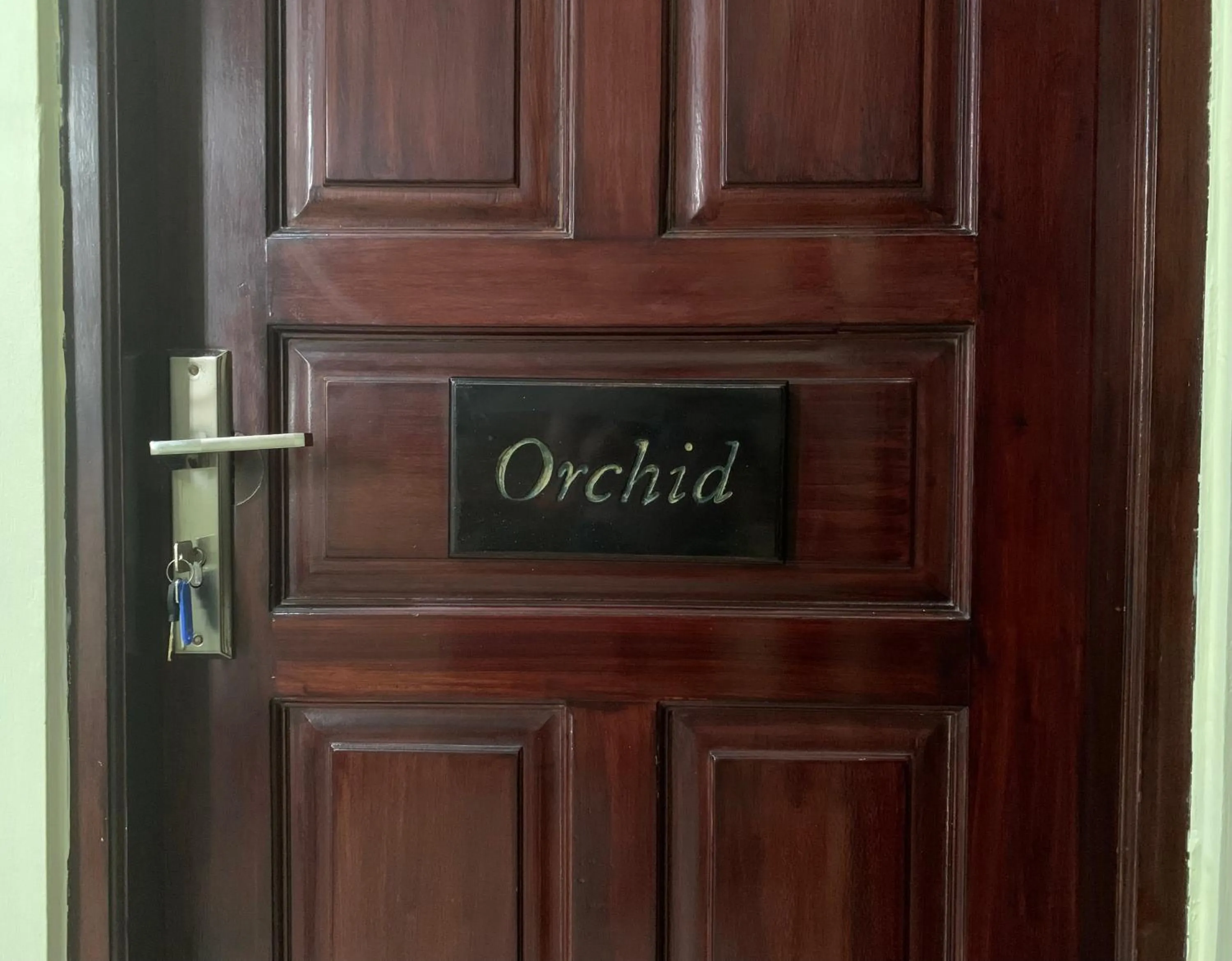 Property logo or sign in Cozy Palm Villa