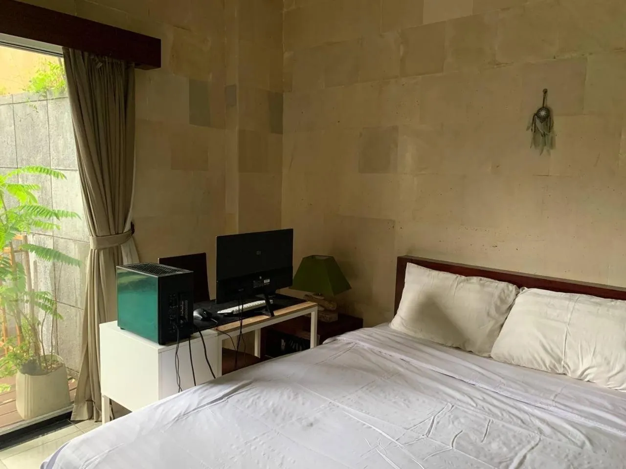 Bed in Cozy Palm Villa