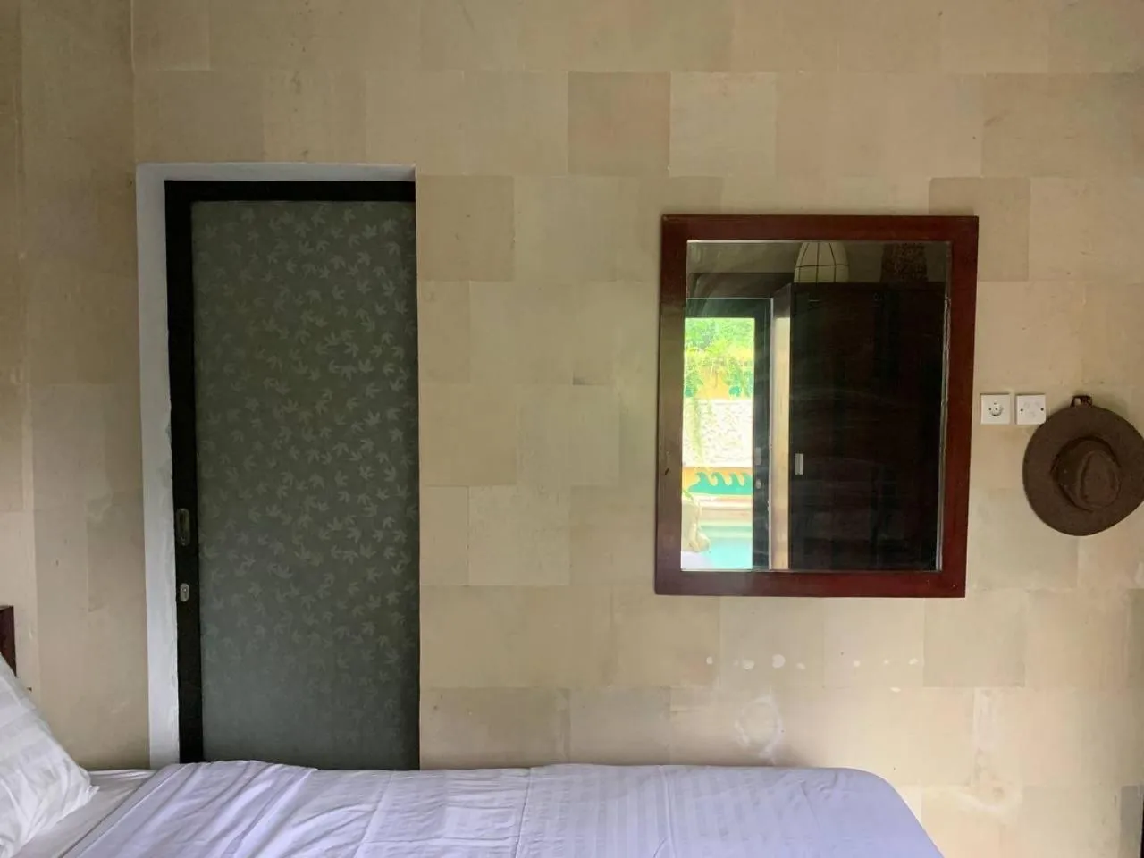 Bed in Cozy Palm Villa