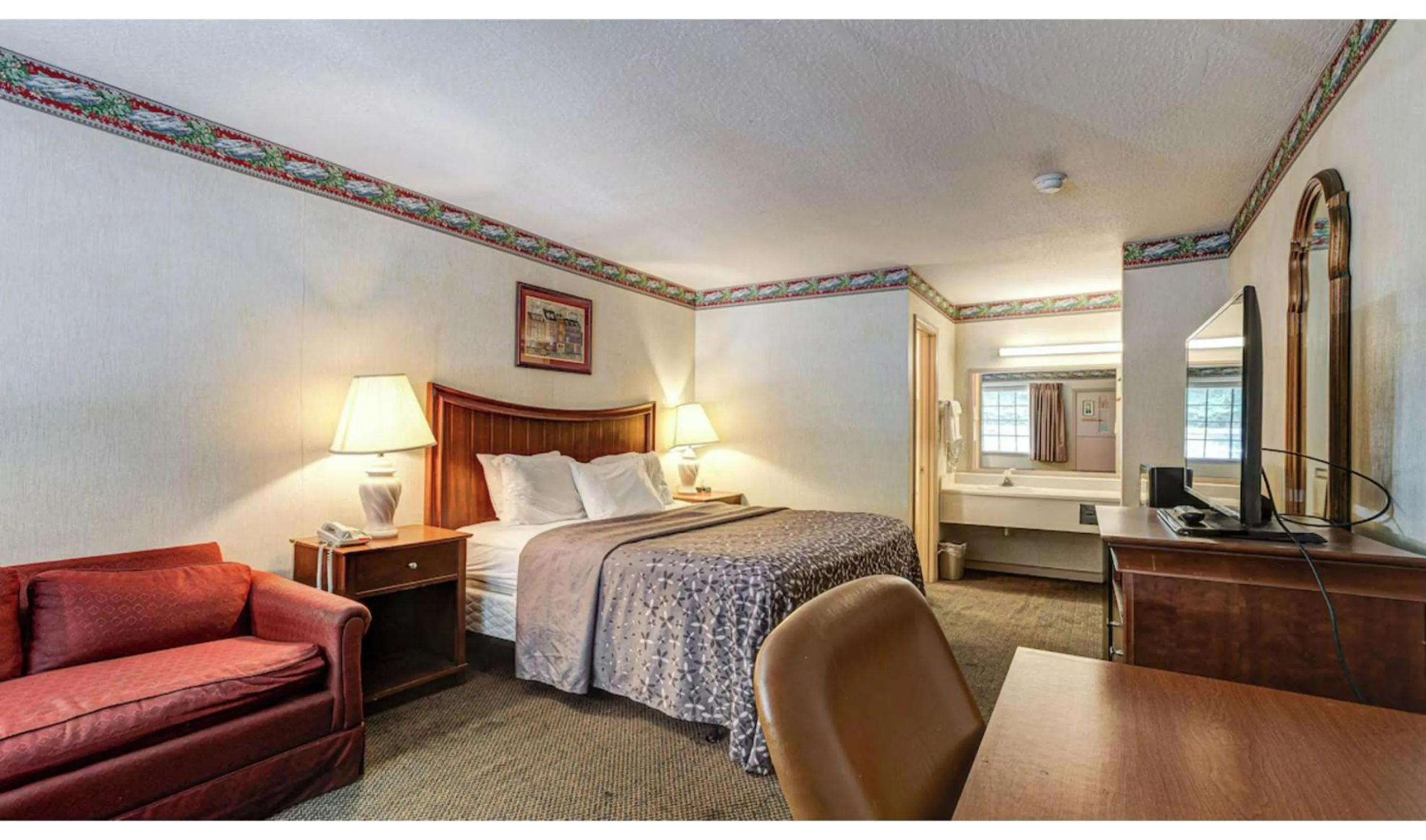 Bedroom, Bed in Northgate Inn by Townhouse Hattiesburg I-59