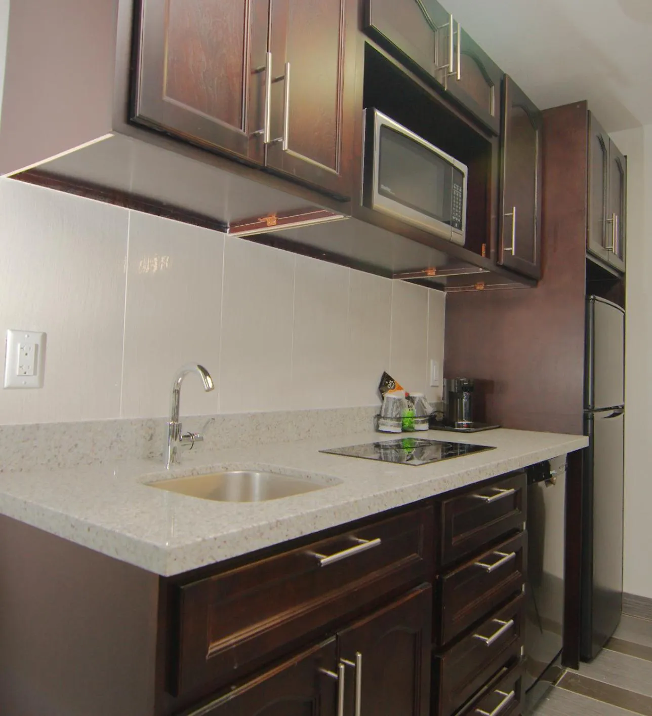 Kitchen or kitchenette in Paradise Inn and Suites Redwater