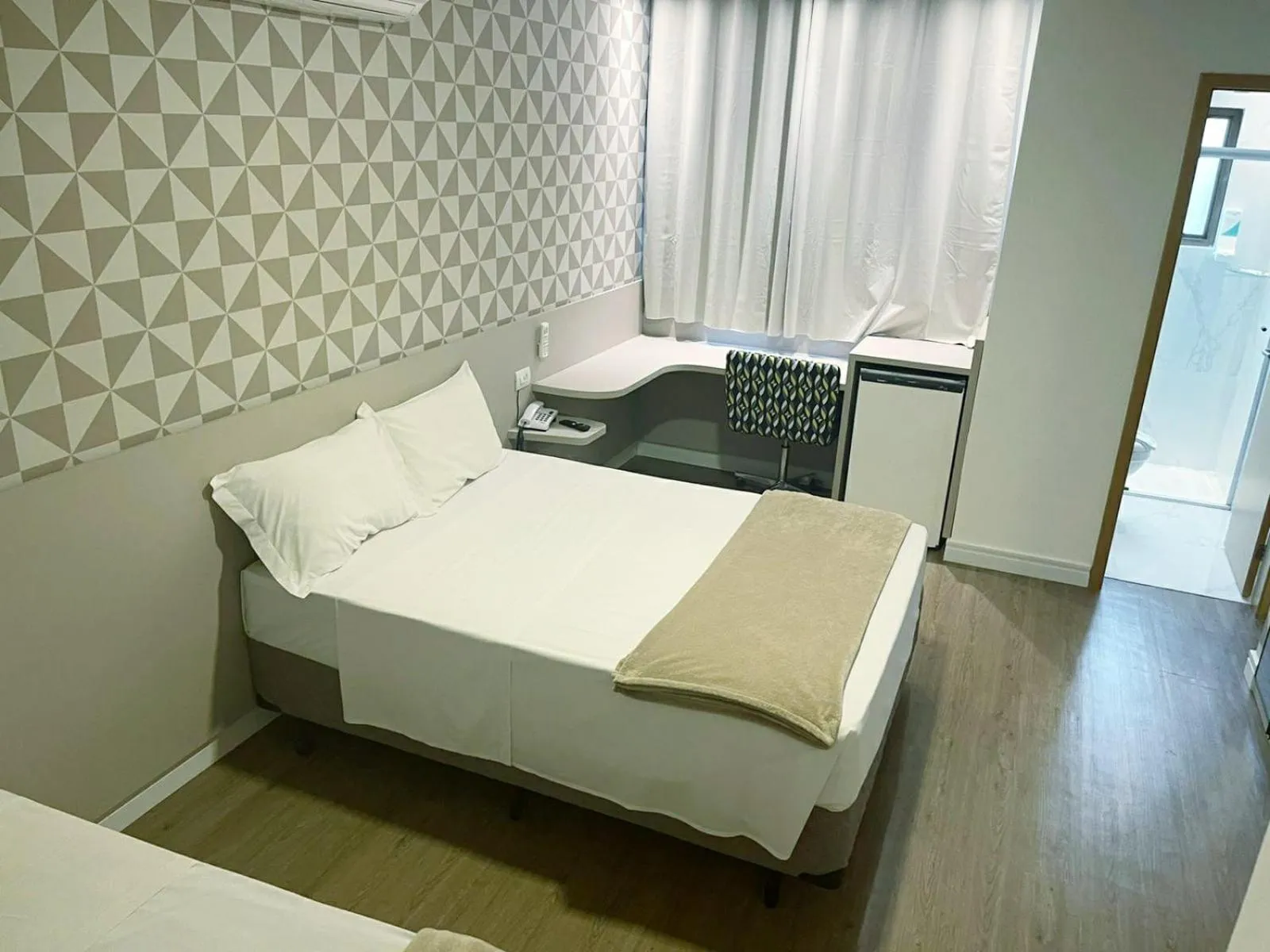 Bed in Hotel Arujá