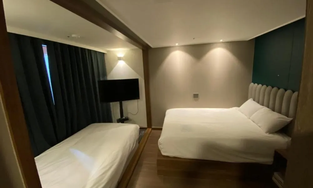 Bed in D OV Haeundae Hotel