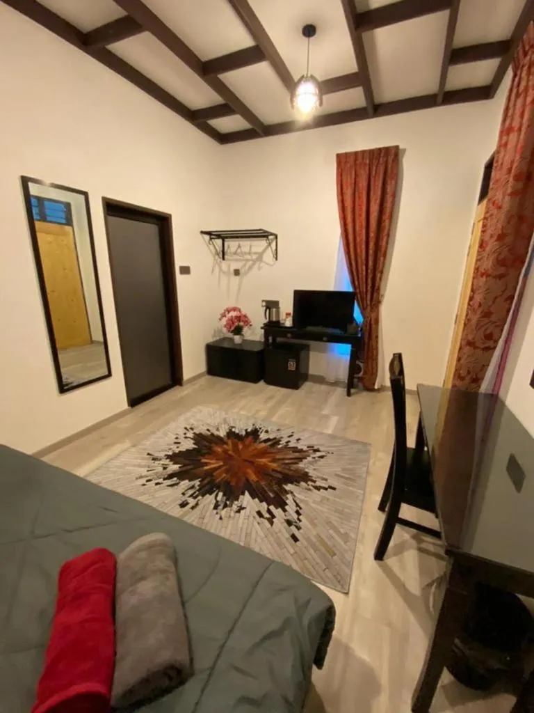 Bed in Maifa Village Chalet