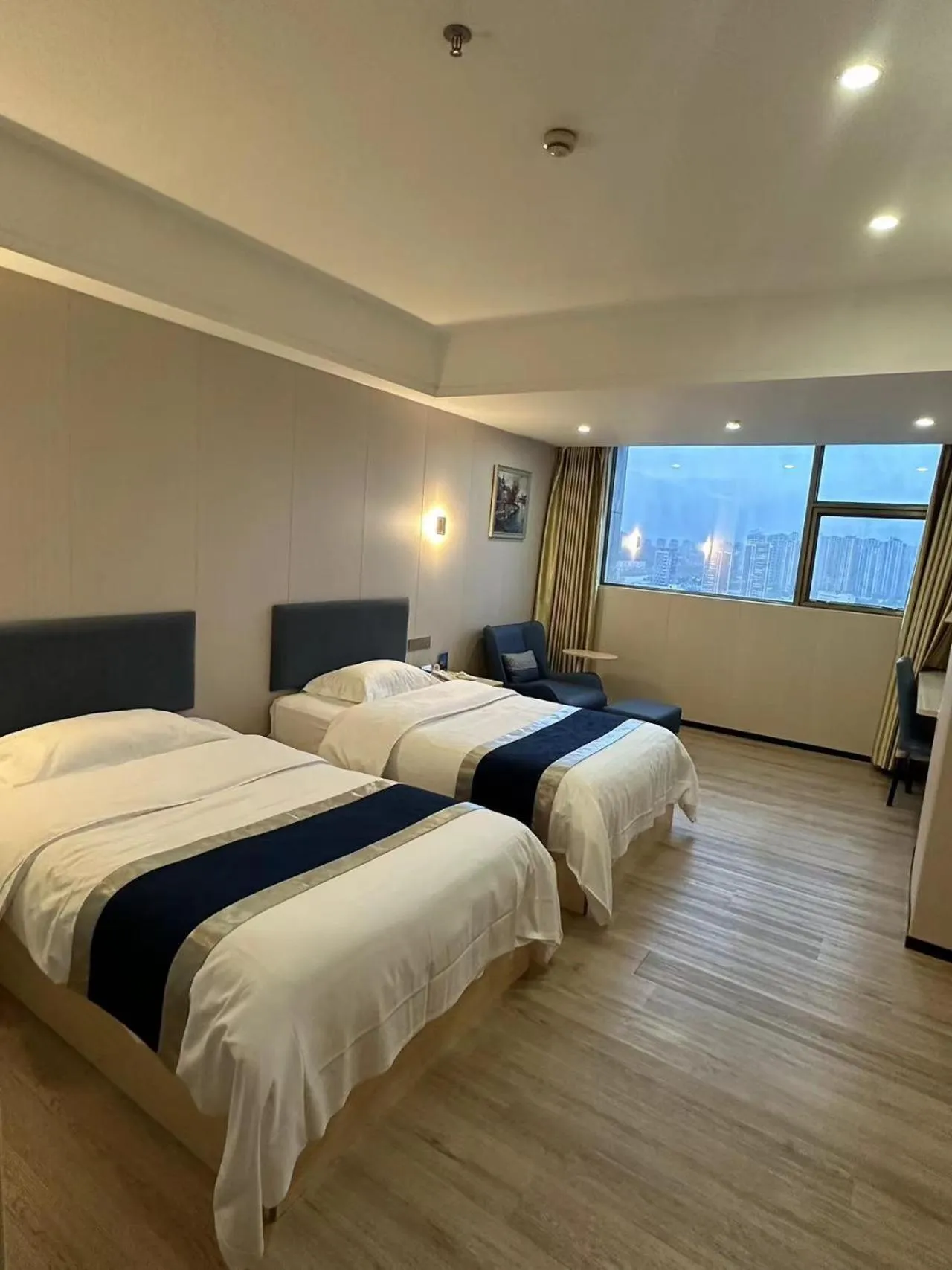 Bed in Green Island Holiday Hotel