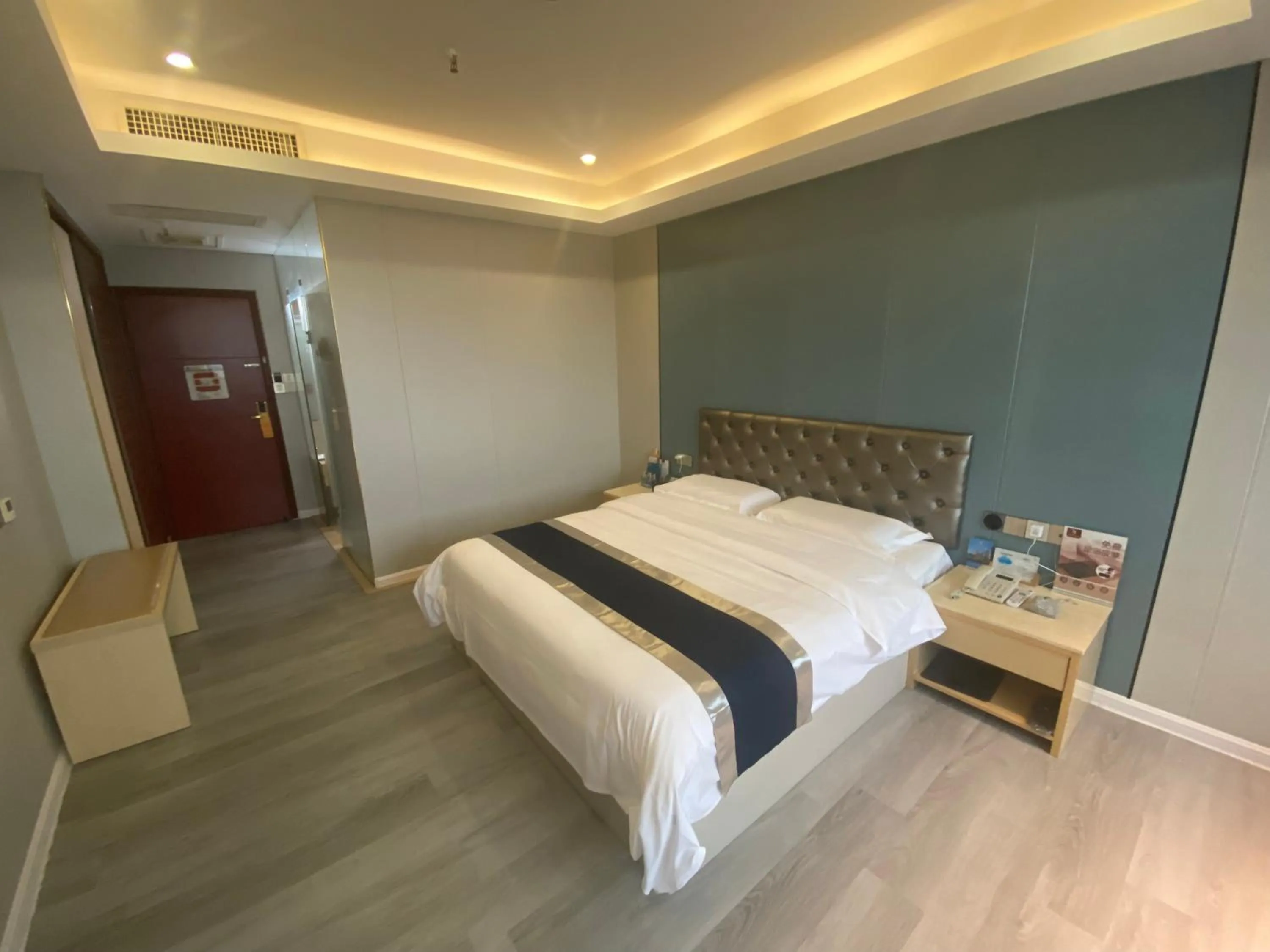 Bed in Green Island Holiday Hotel