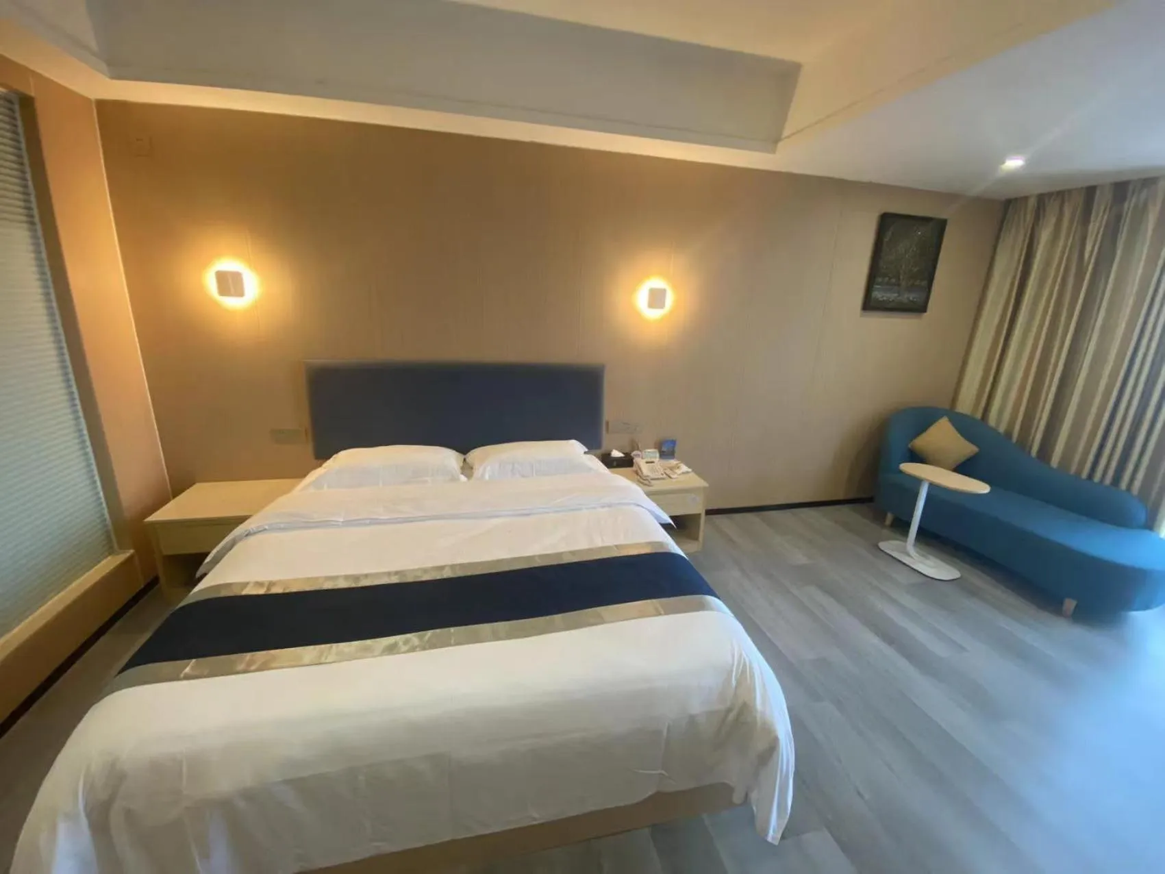 Bed in Green Island Holiday Hotel