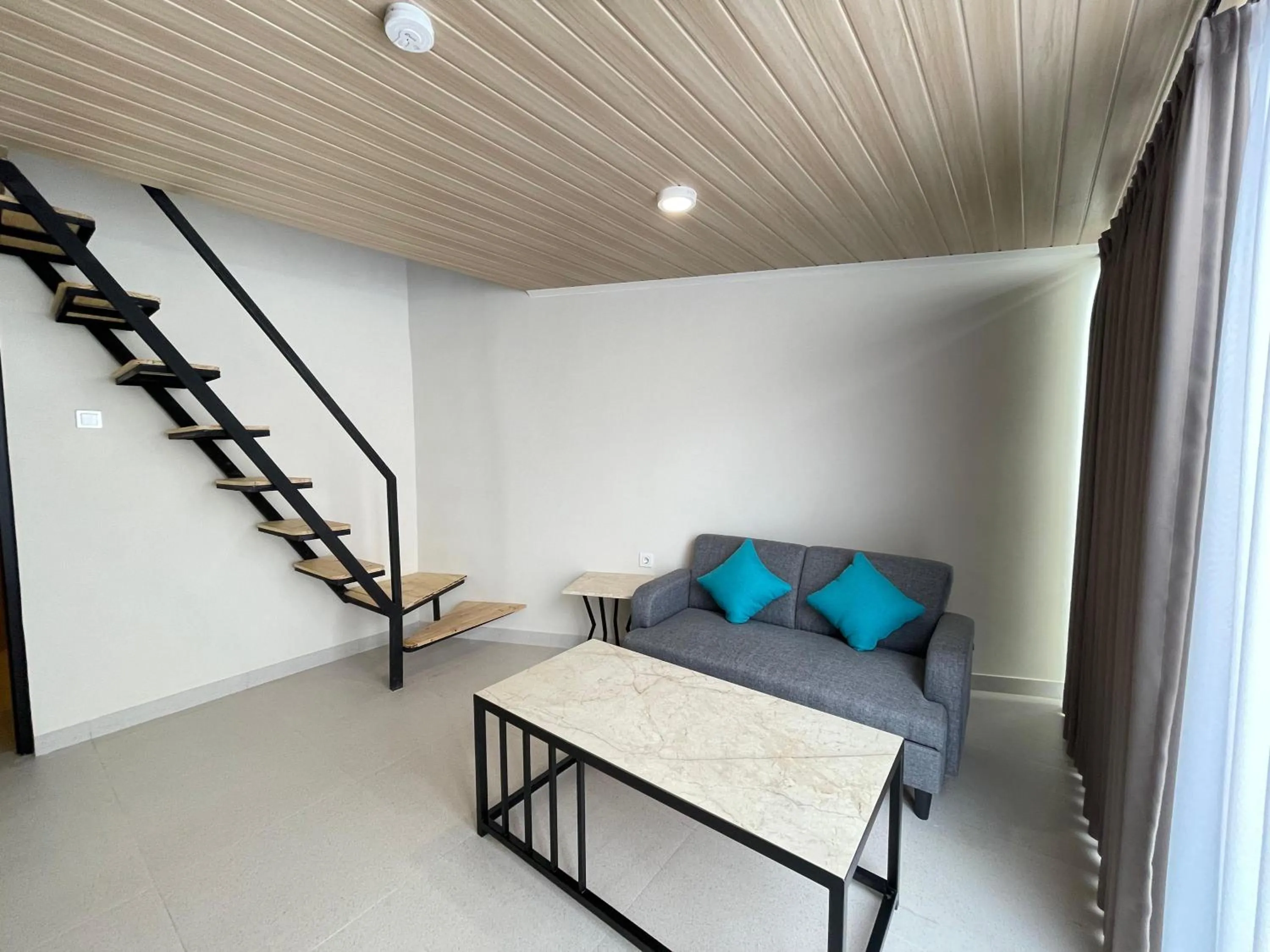 Seating area in Azana Essence Sanggabuana Bogor