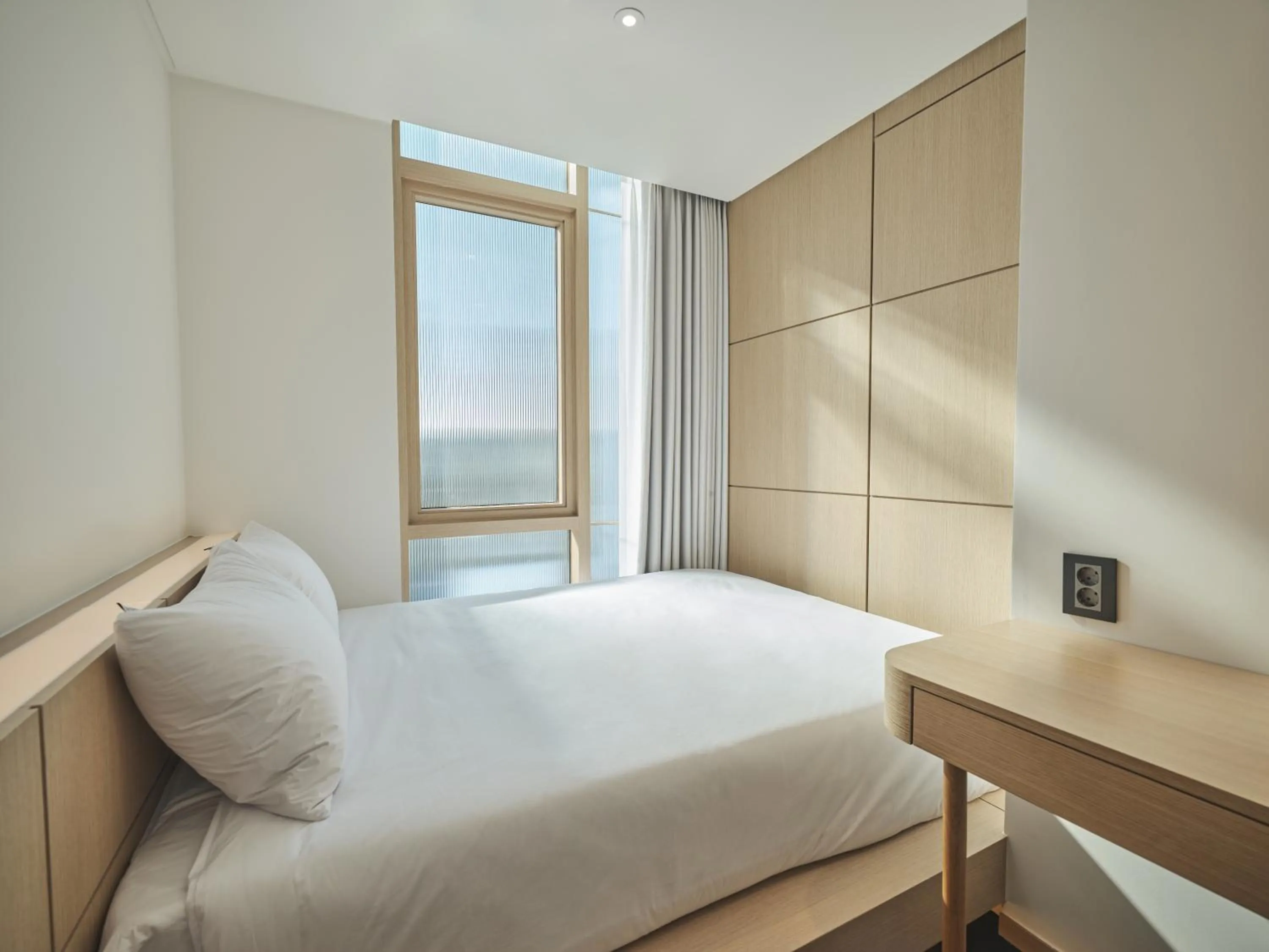 Bed in UH Suite The Seoul