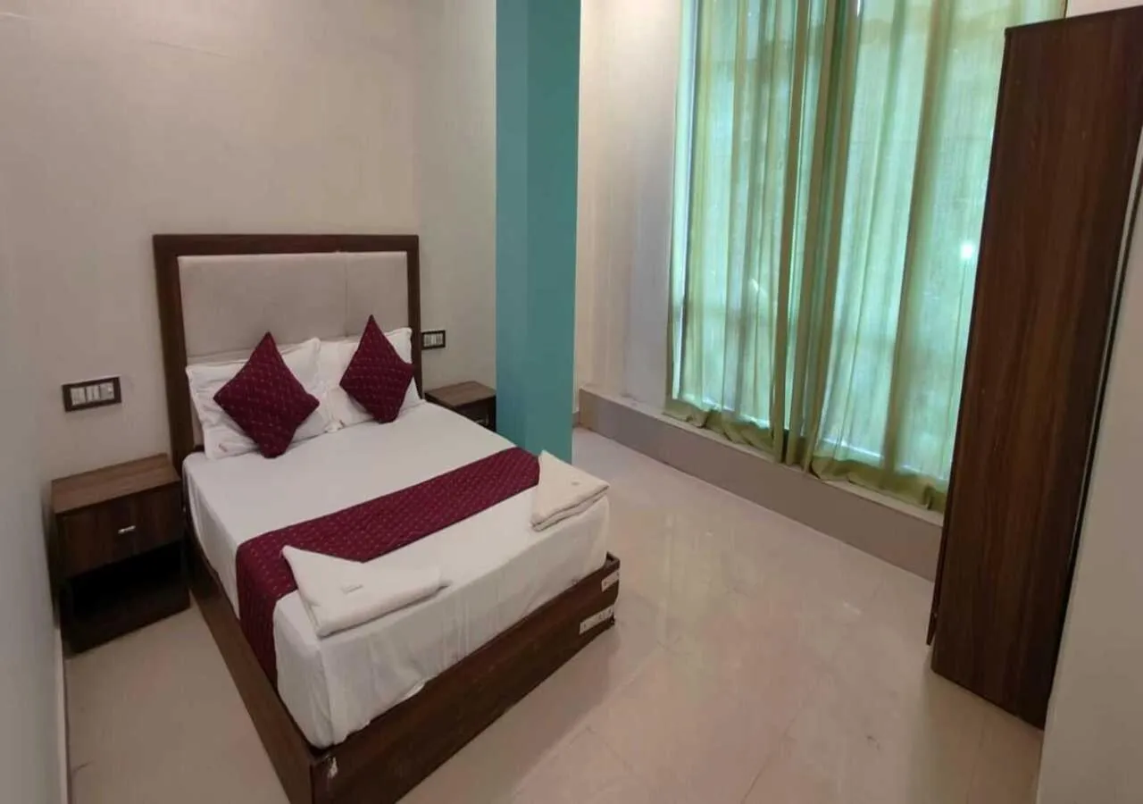 Bed in Hotel Blue Sky Residency