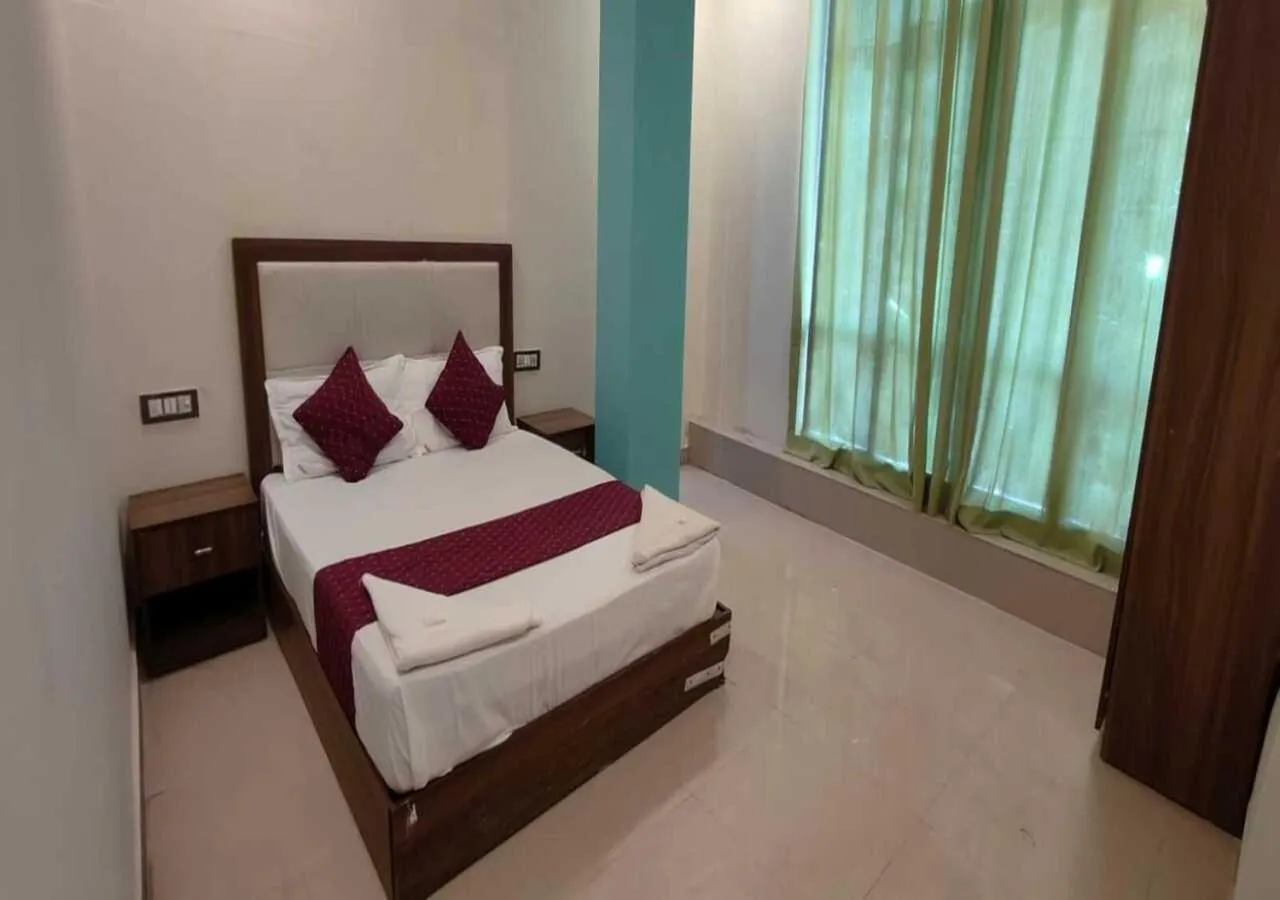 Bed in Hotel Blue Sky Residency