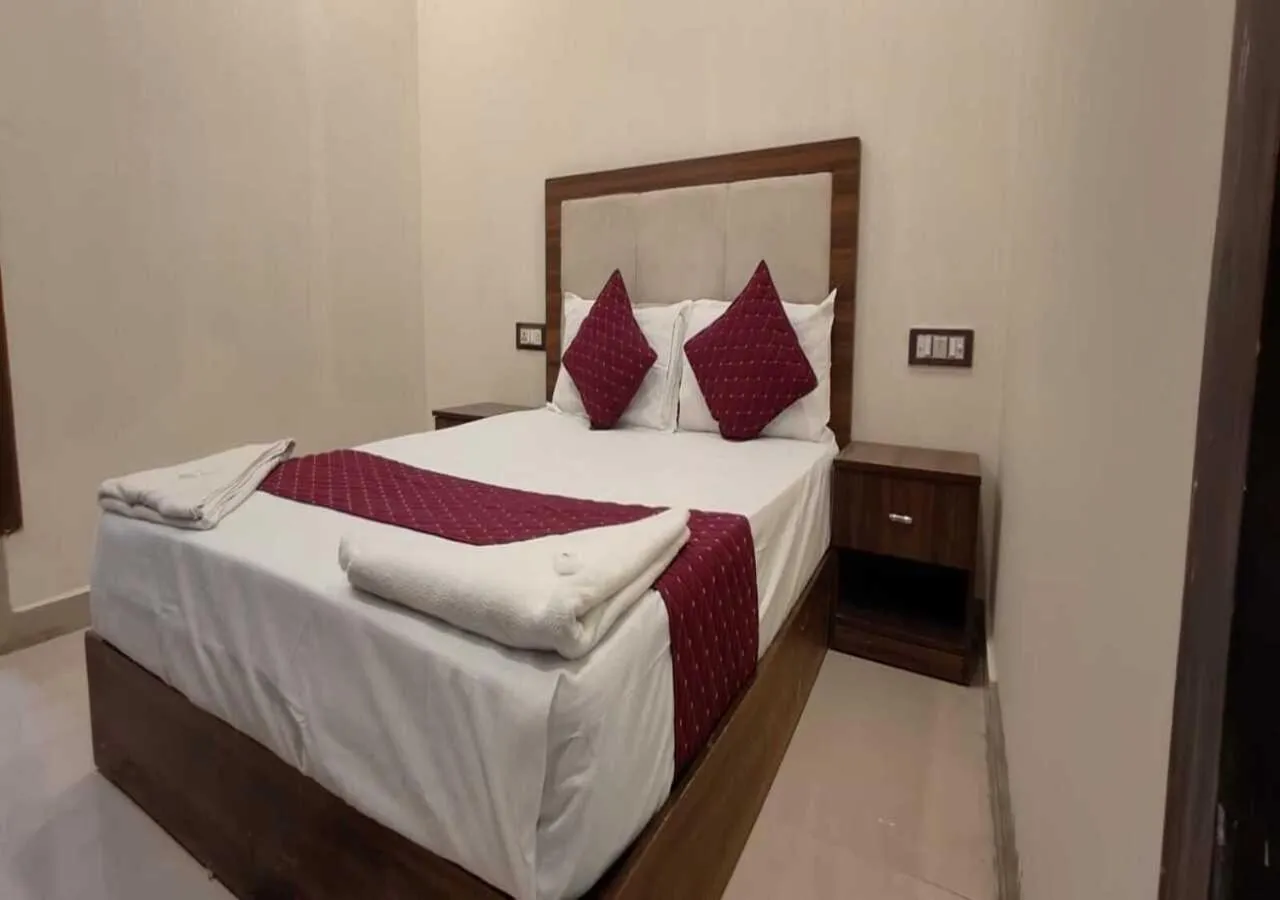 Bed in Hotel Blue Sky Residency