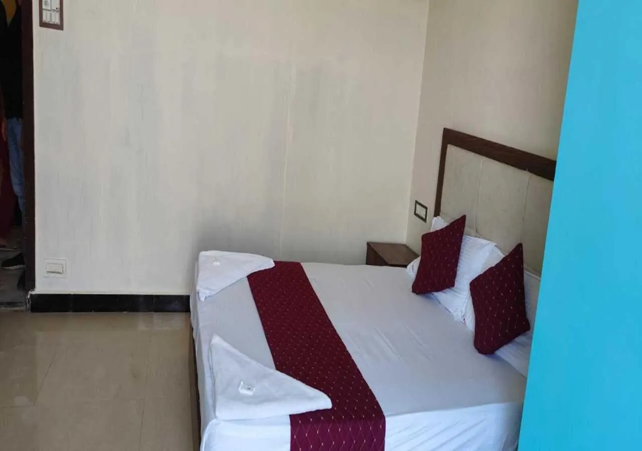 Bed in Hotel Blue Sky Residency