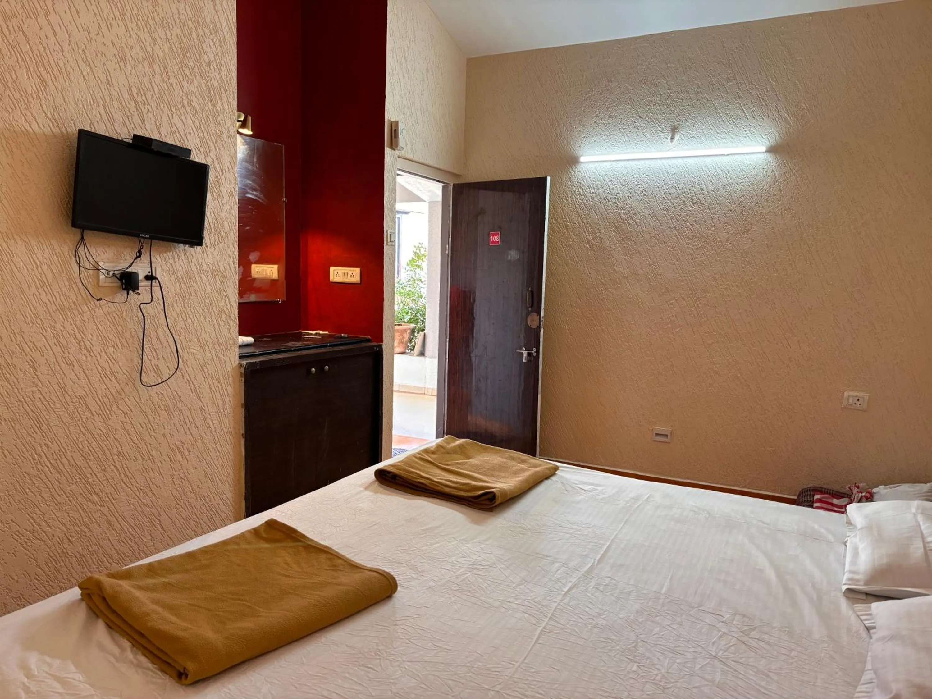 Bed in Hotel Sai Plaza