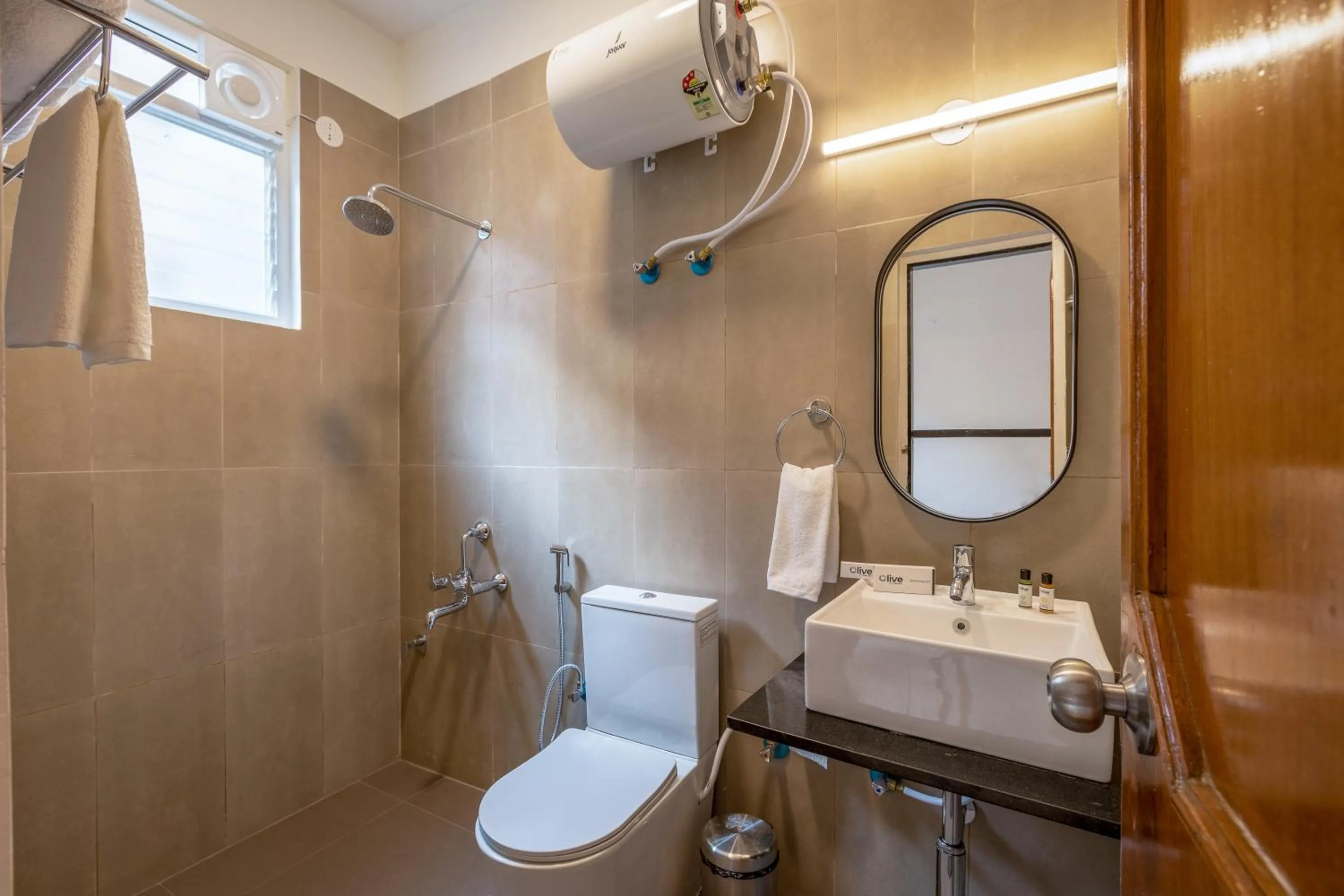 Bathroom in Olive Hotel Palace Road by Embassy Group