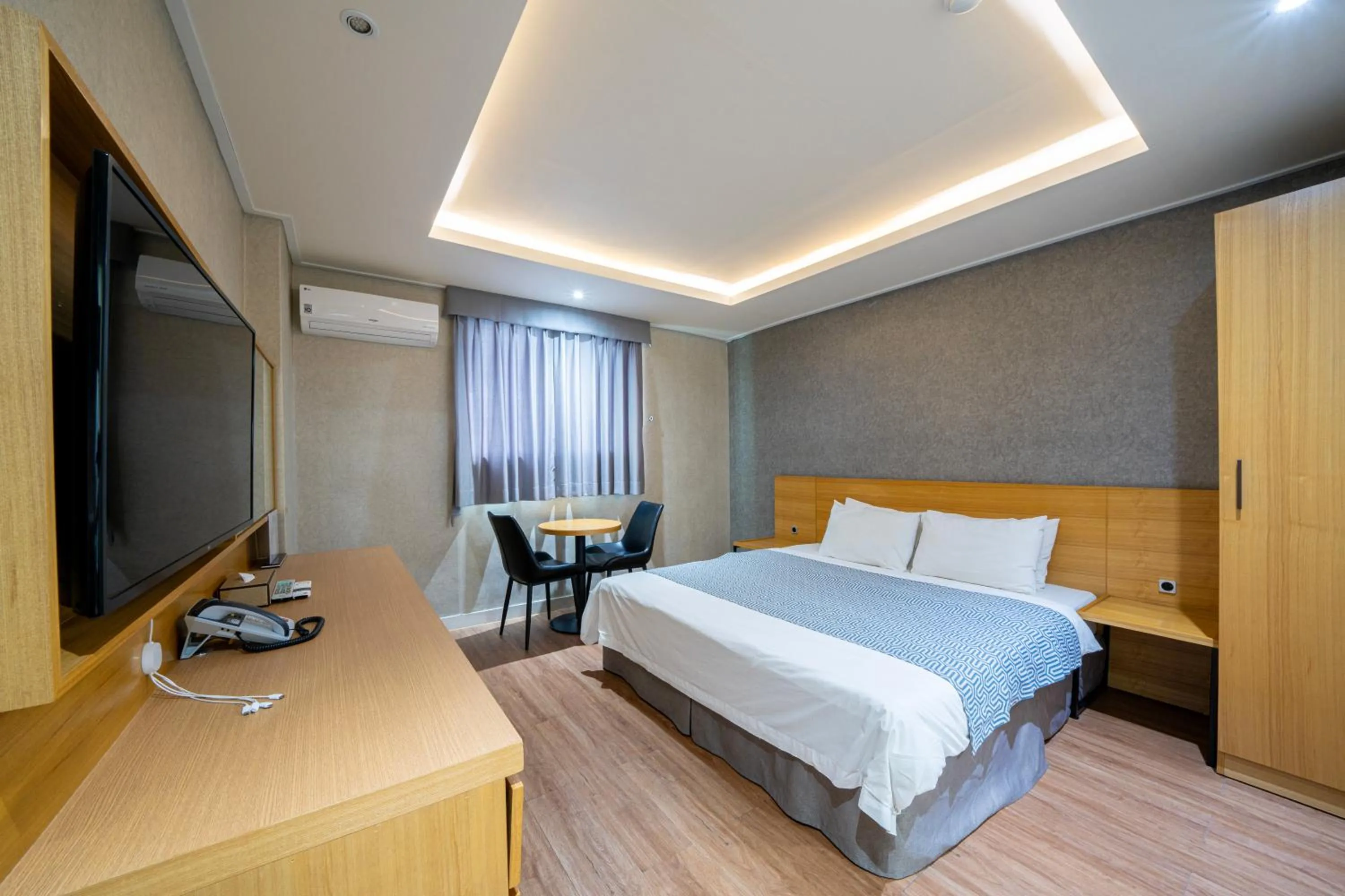 Bed in I-check Hyunjin Hotel