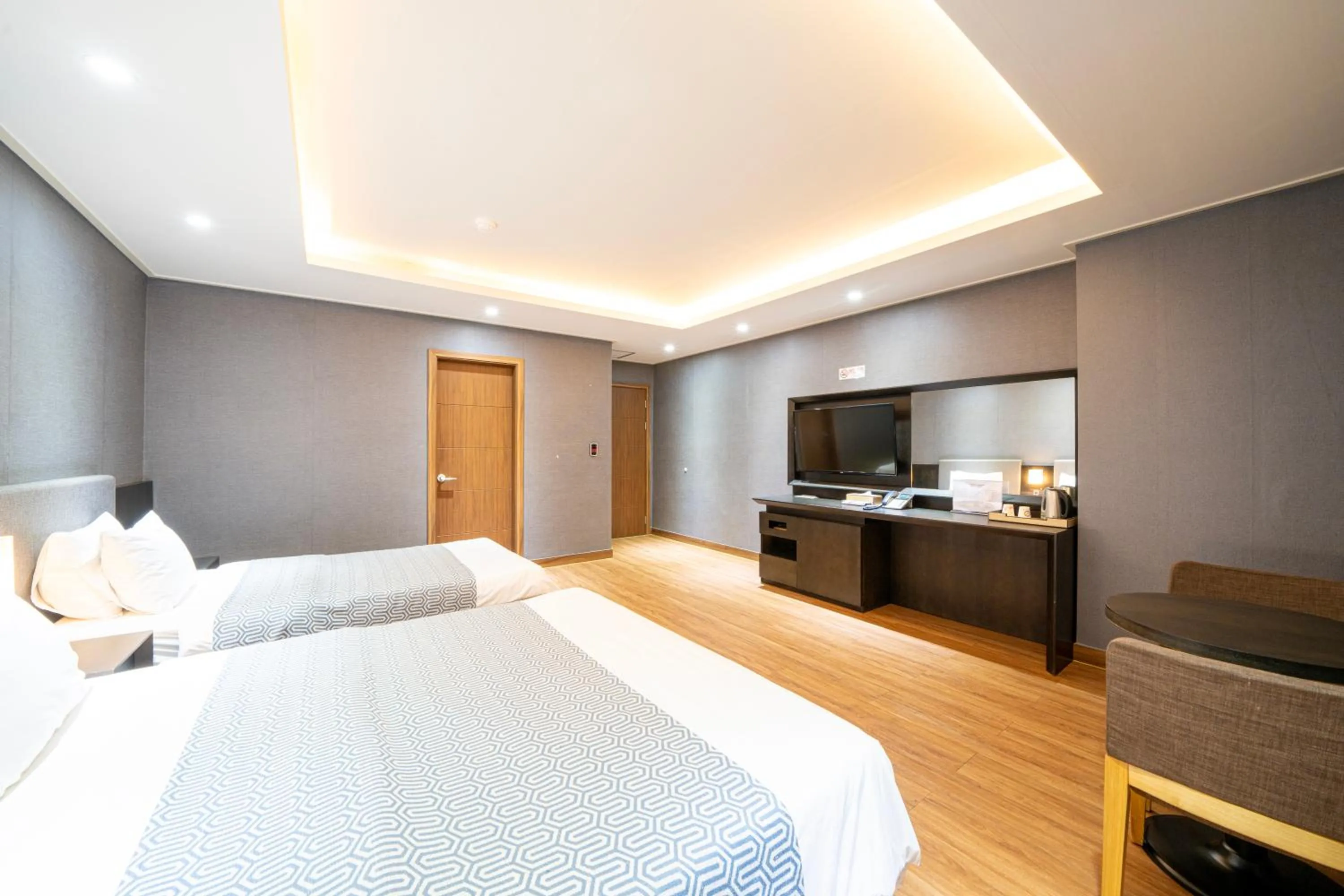 Bed in I-check Hyunjin Hotel