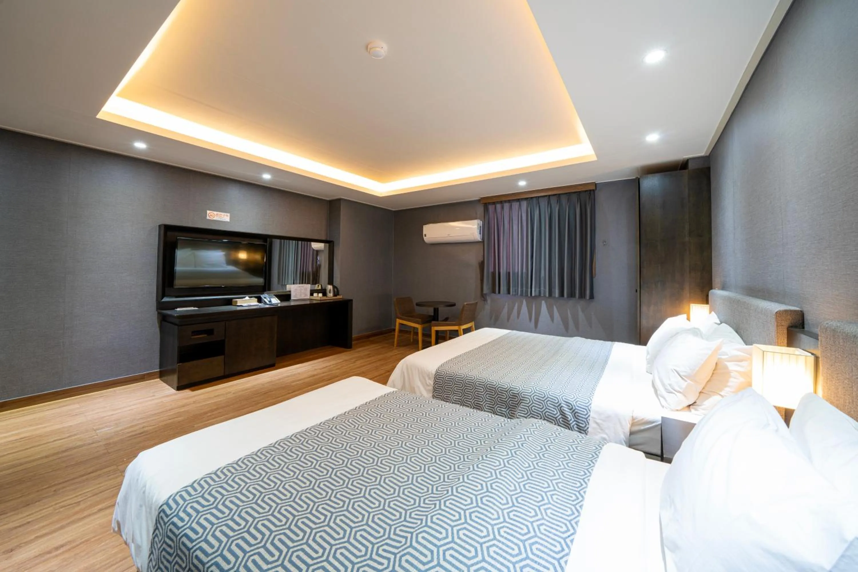 Bed in I-check Hyunjin Hotel