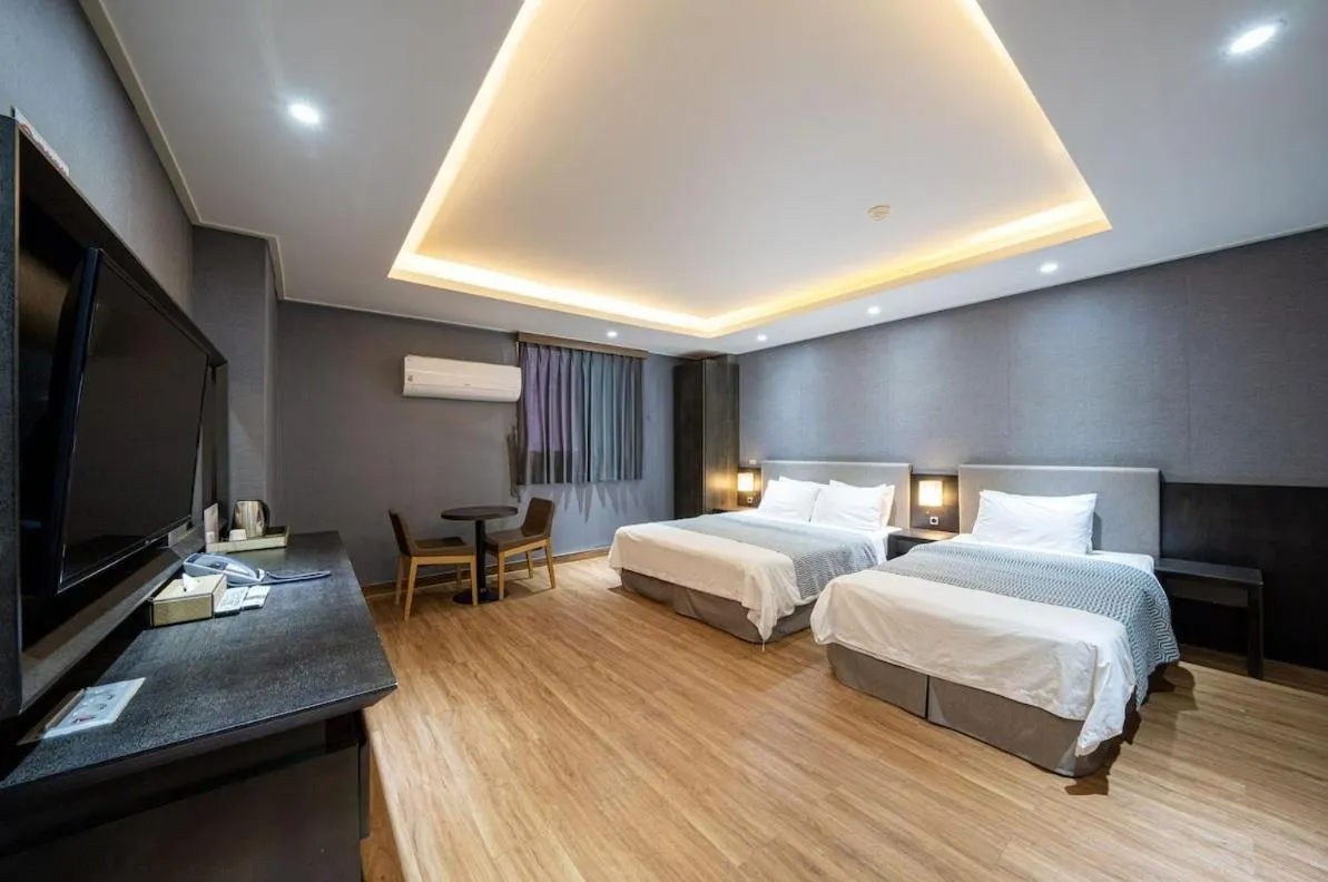 Bed in I-check Hyunjin Hotel