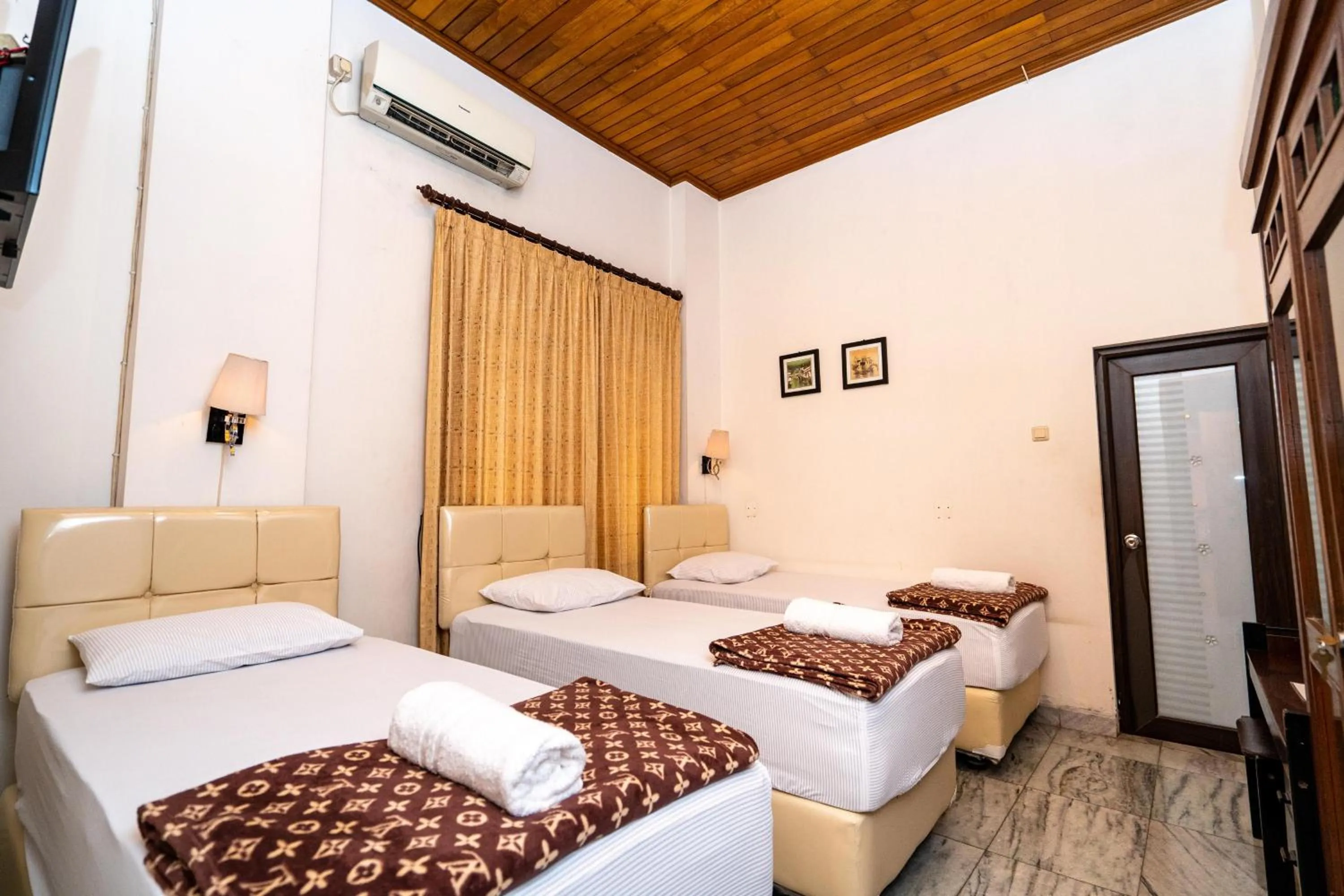 Bed in D Ajenk Boutique Guesthouse