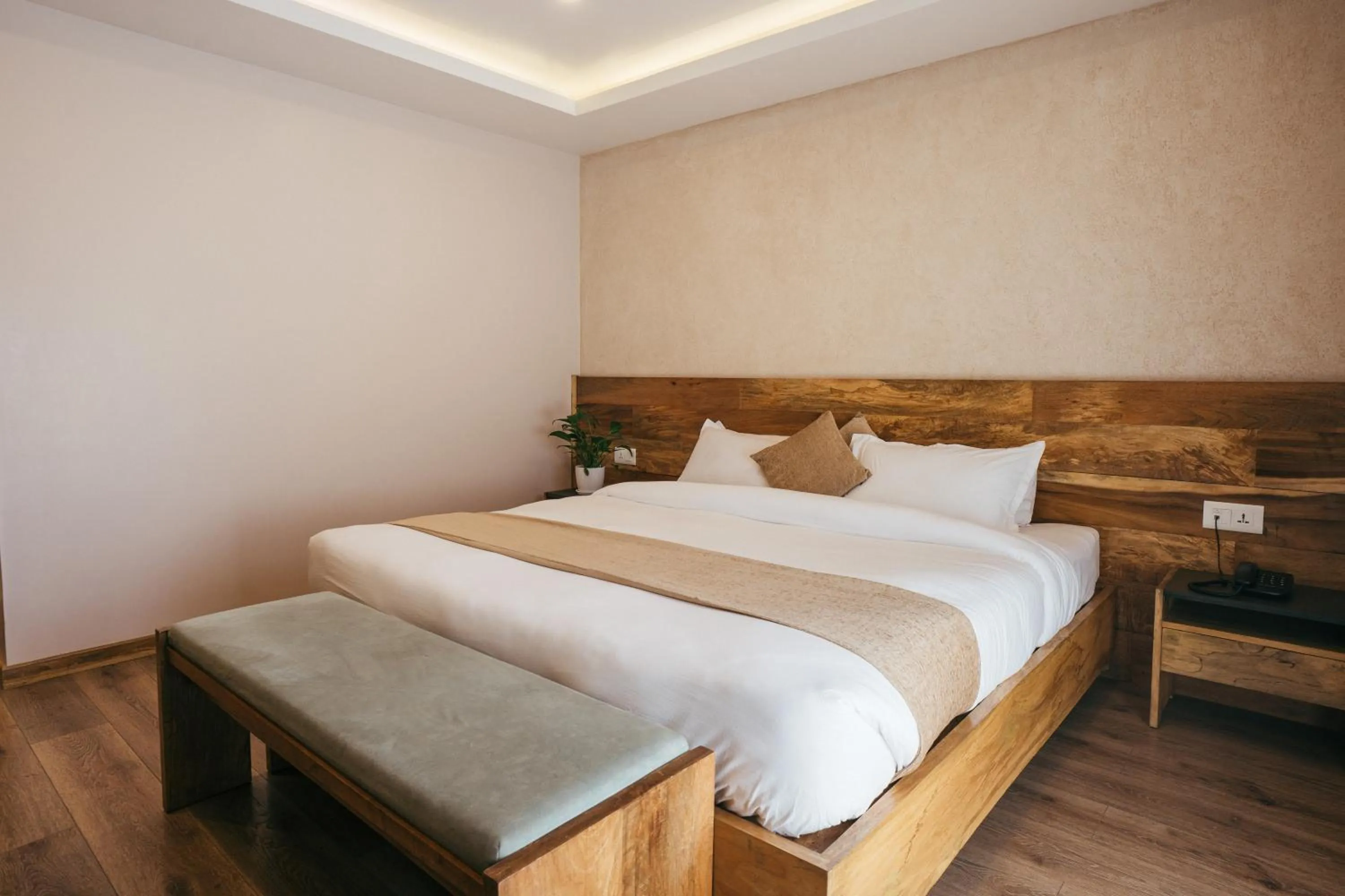 Bed in HOTEL BHRIKUTI TARA