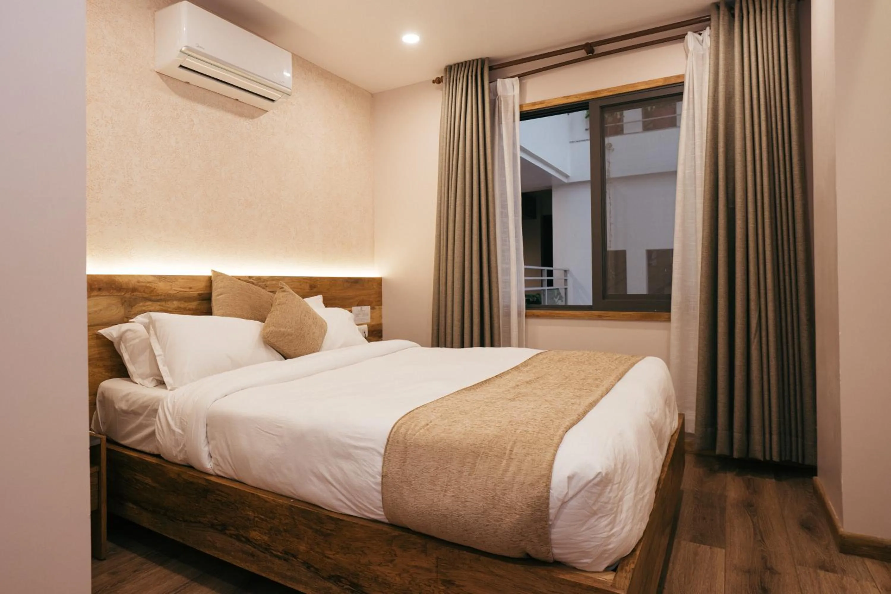 Bed in HOTEL BHRIKUTI TARA