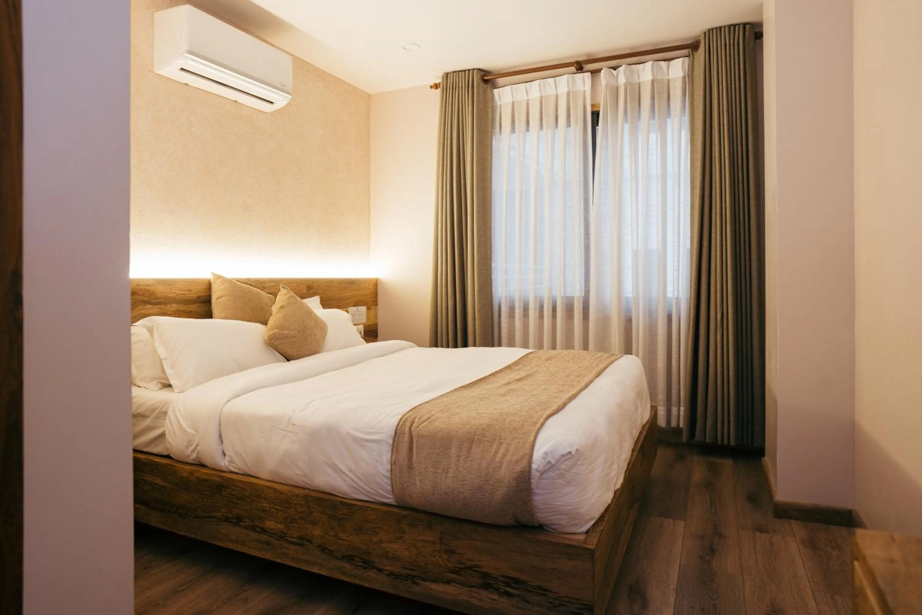 Bed in HOTEL BHRIKUTI TARA