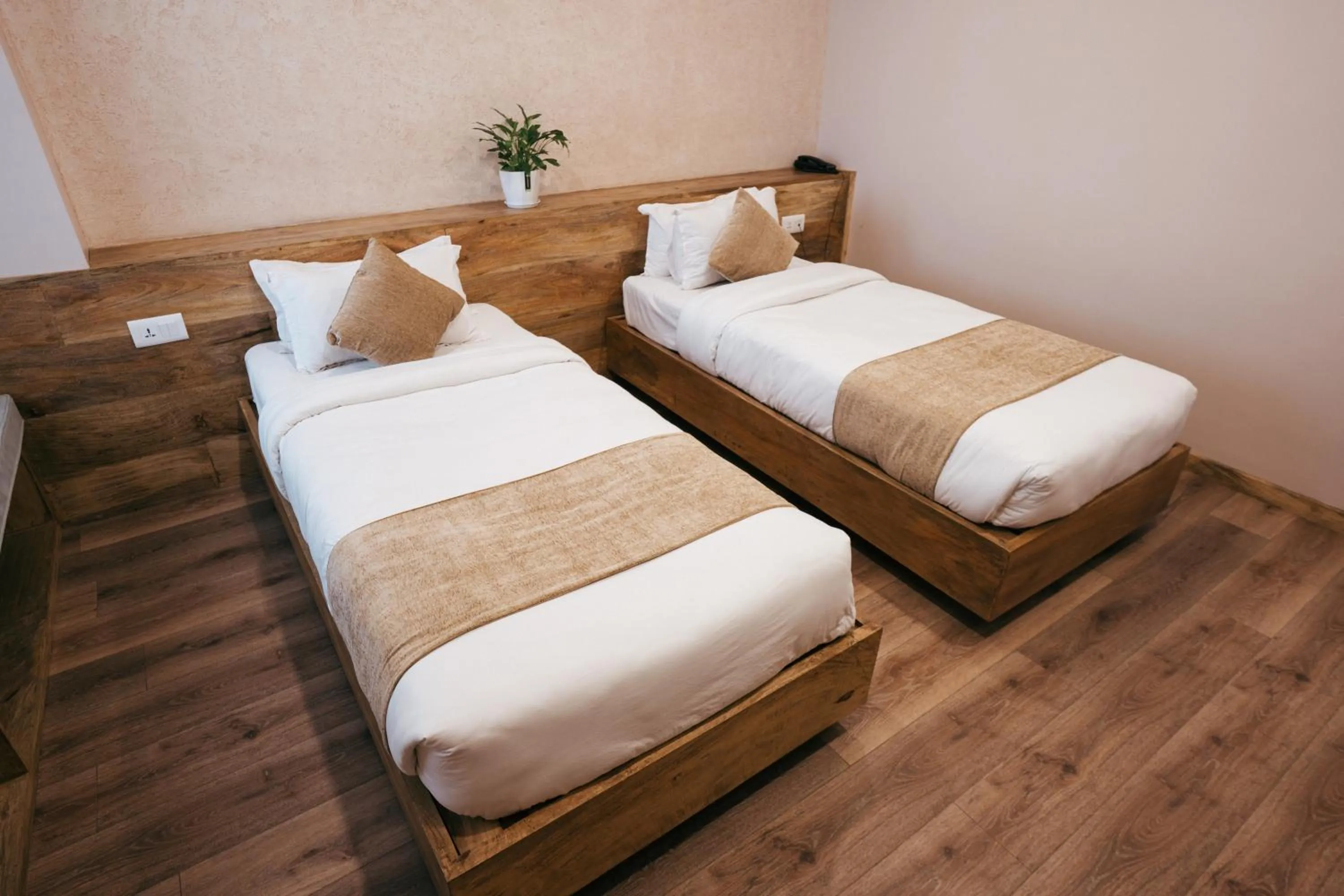 Bed in HOTEL BHRIKUTI TARA