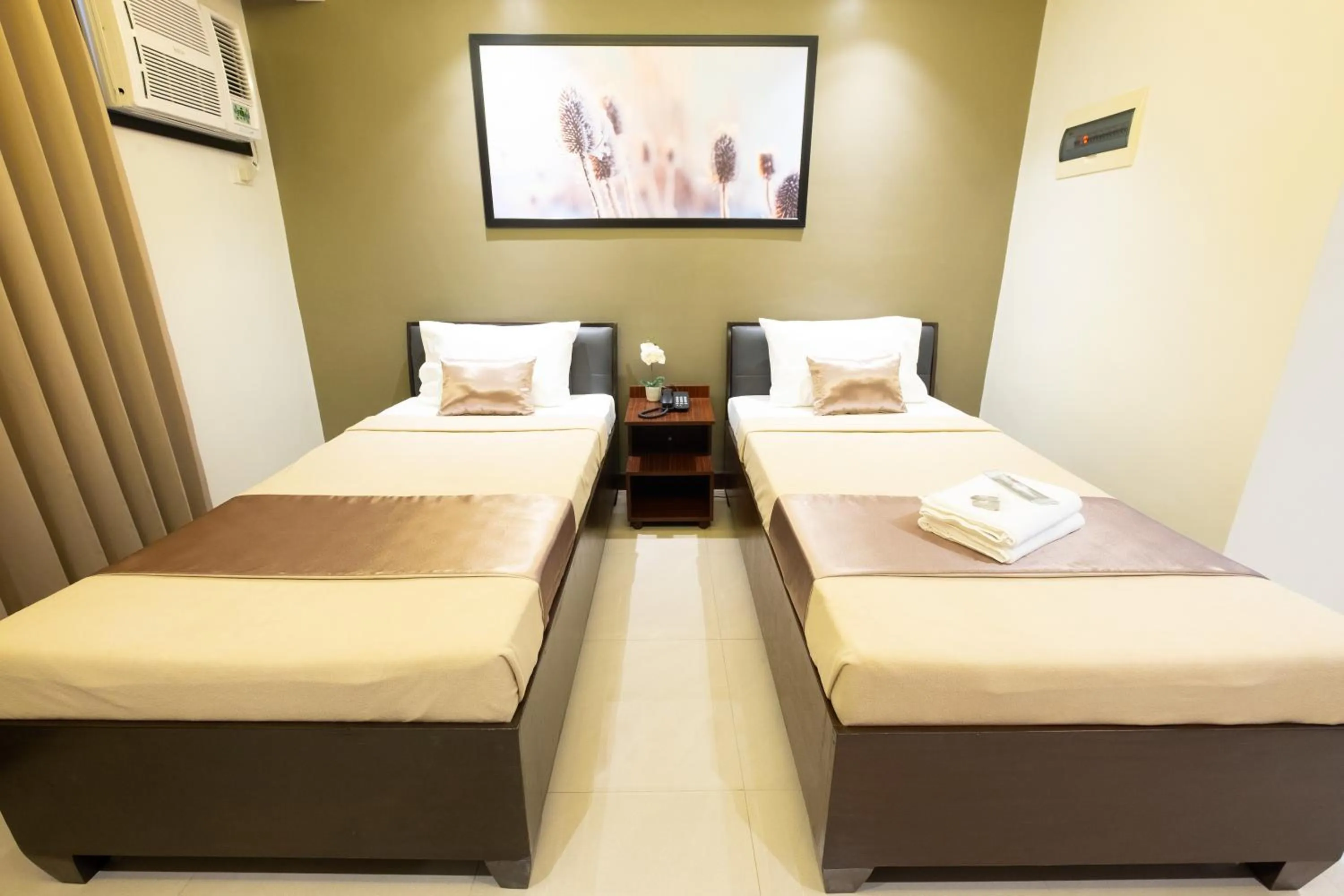 Bed in Soleil Suites Cebu