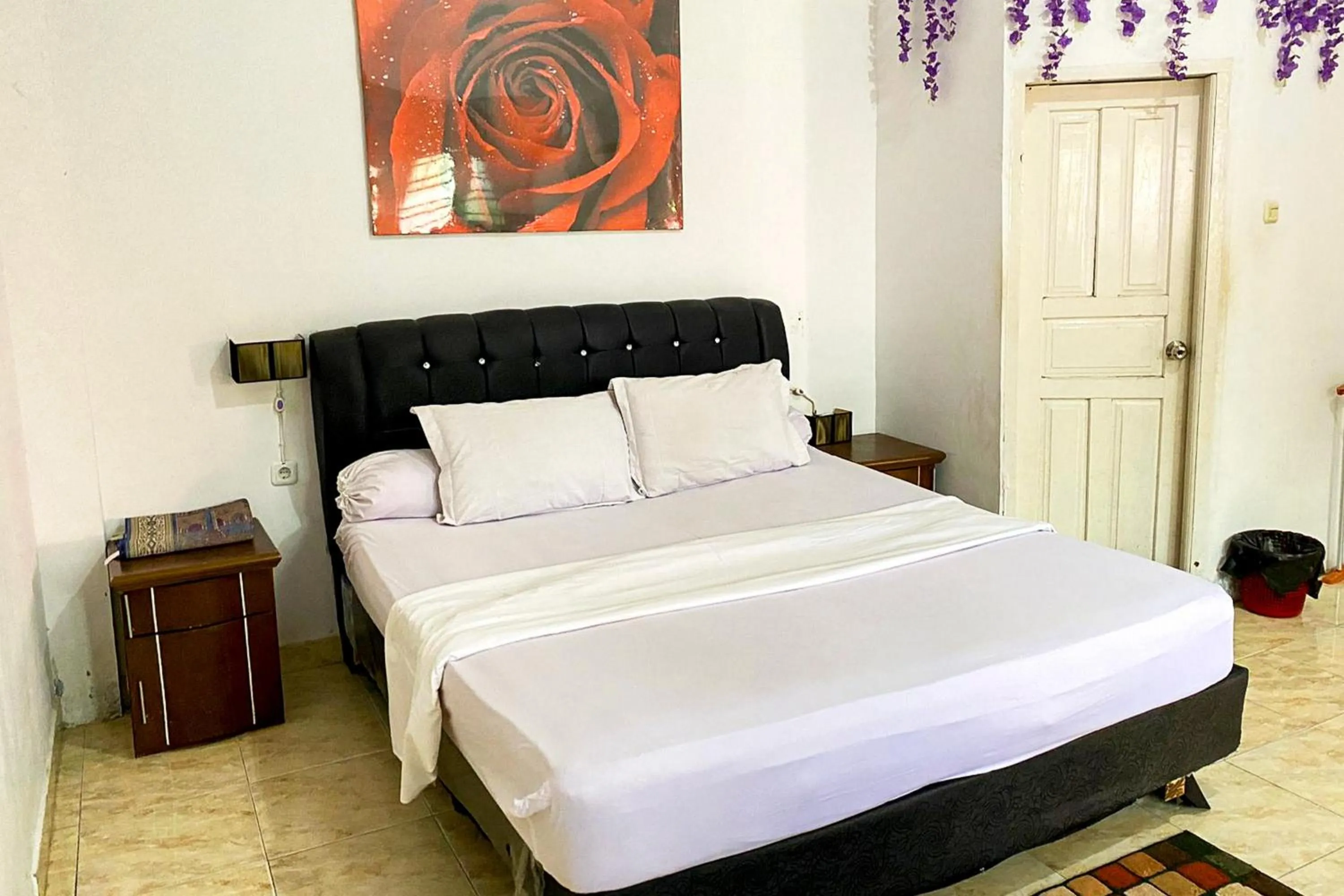 Bed in RedDoorz Syariah Near Balai Meuseuraya Aceh