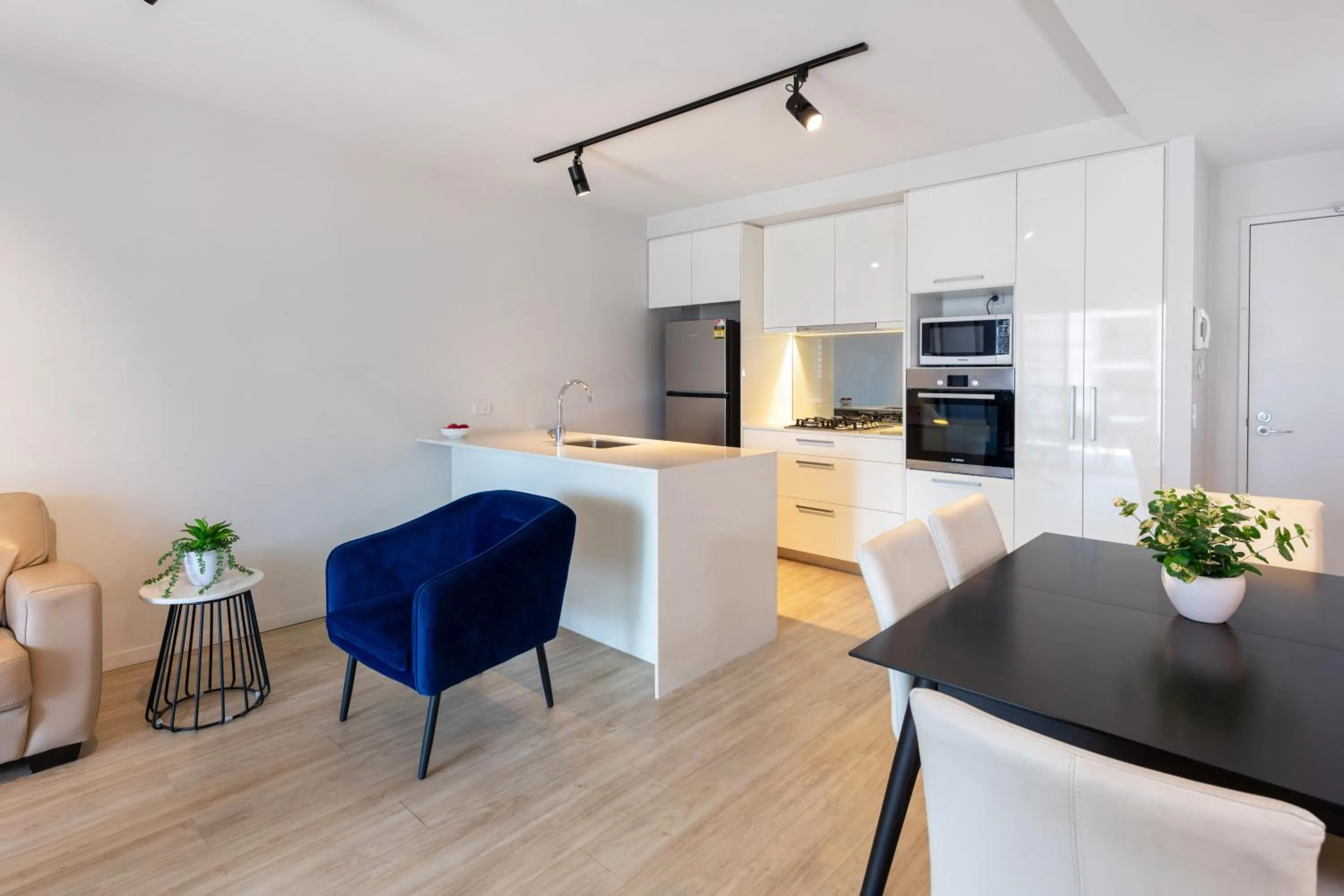 Seating area in Arena Apartments by CLLIX