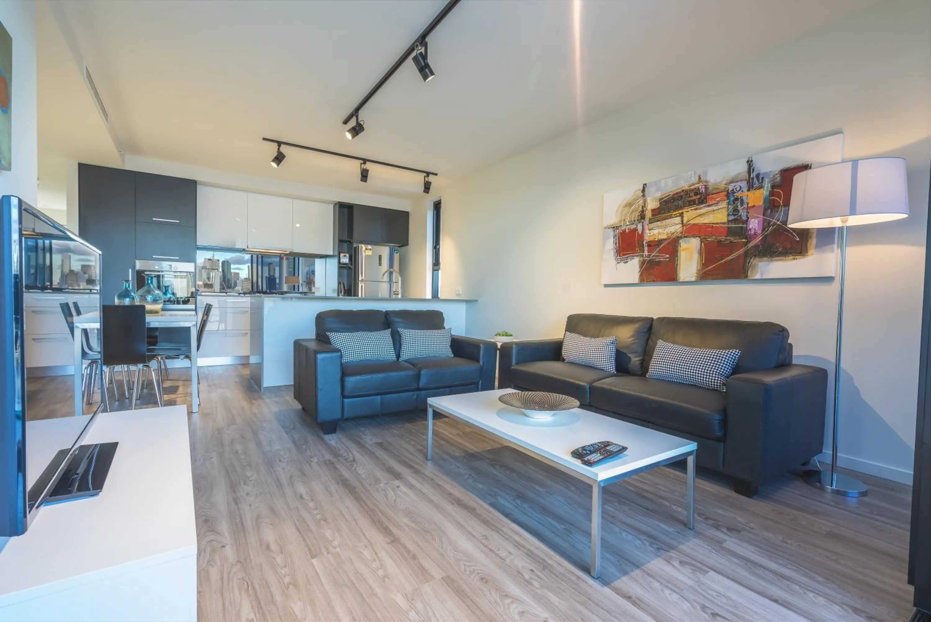 Living room in Arena Apartments by CLLIX