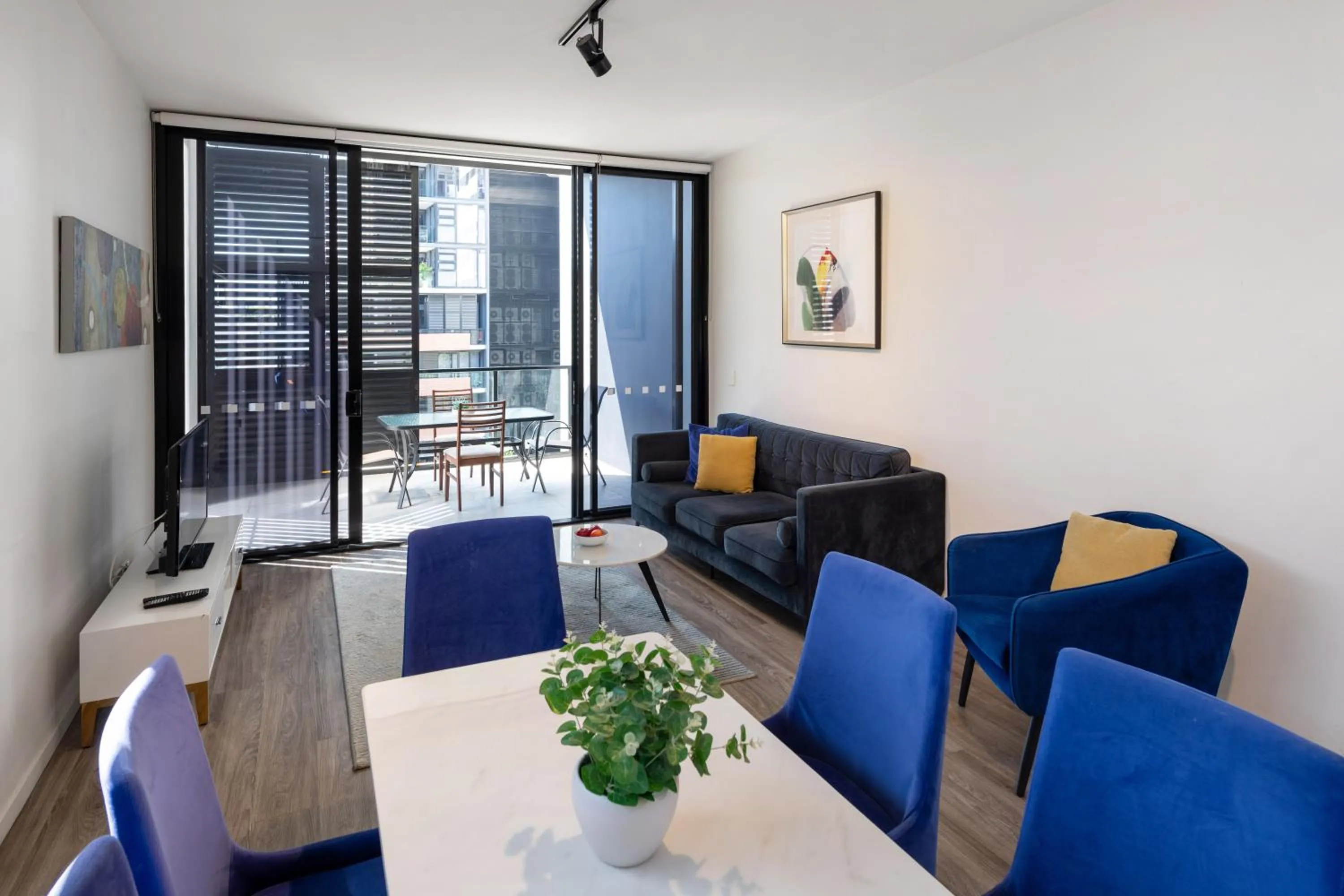 Living room in Arena Apartments by CLLIX